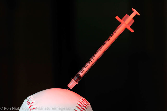 Baseball with Hypodermic Needle
