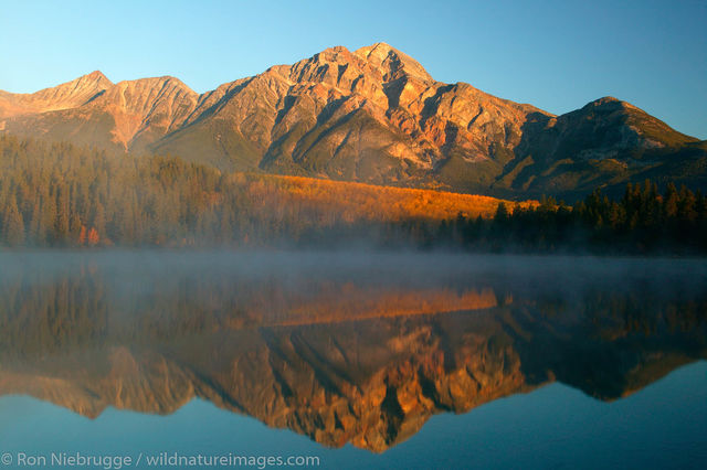 Pyramid Mountain reflects into Patricia Lake