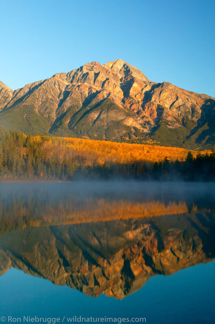 Pyramid Mountain reflects into Patricia Lake