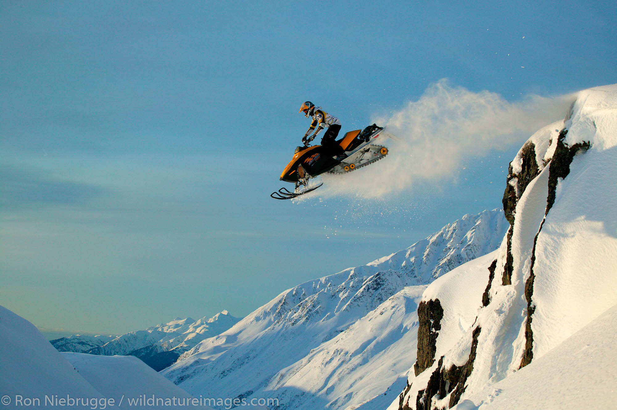 Jake Boulden snowmobiling in Chugach National Forest, Alaska.