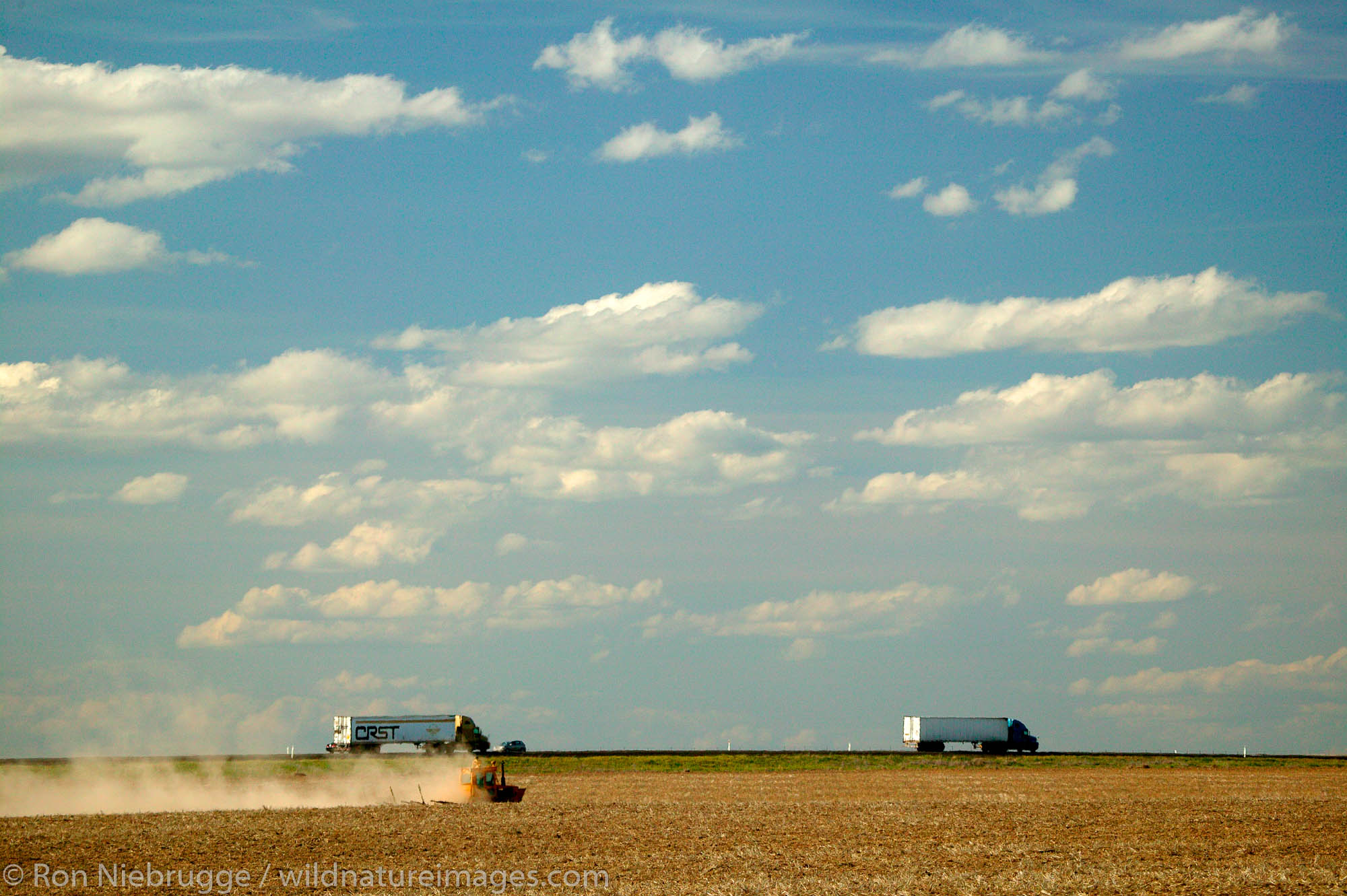 A farmer working the fields along I-90 on farmland near Ritzville, Eastern Washington.