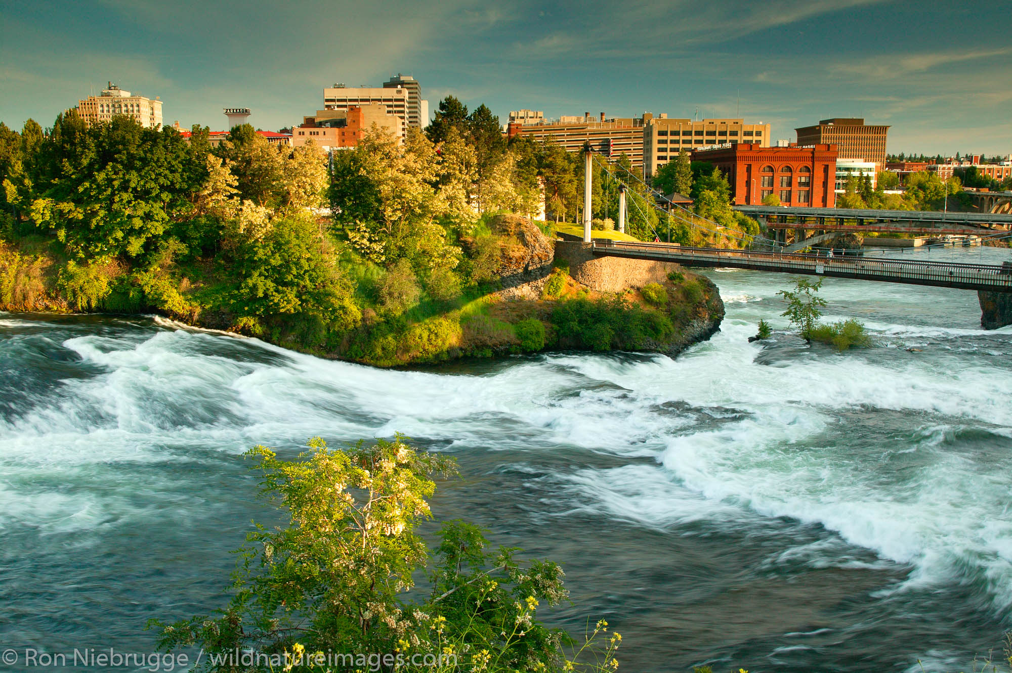 The waterfalls along the Spokane River and Riverfront Park, downtown Spokane, Washington.  Riverfront Park was site of the 1974...