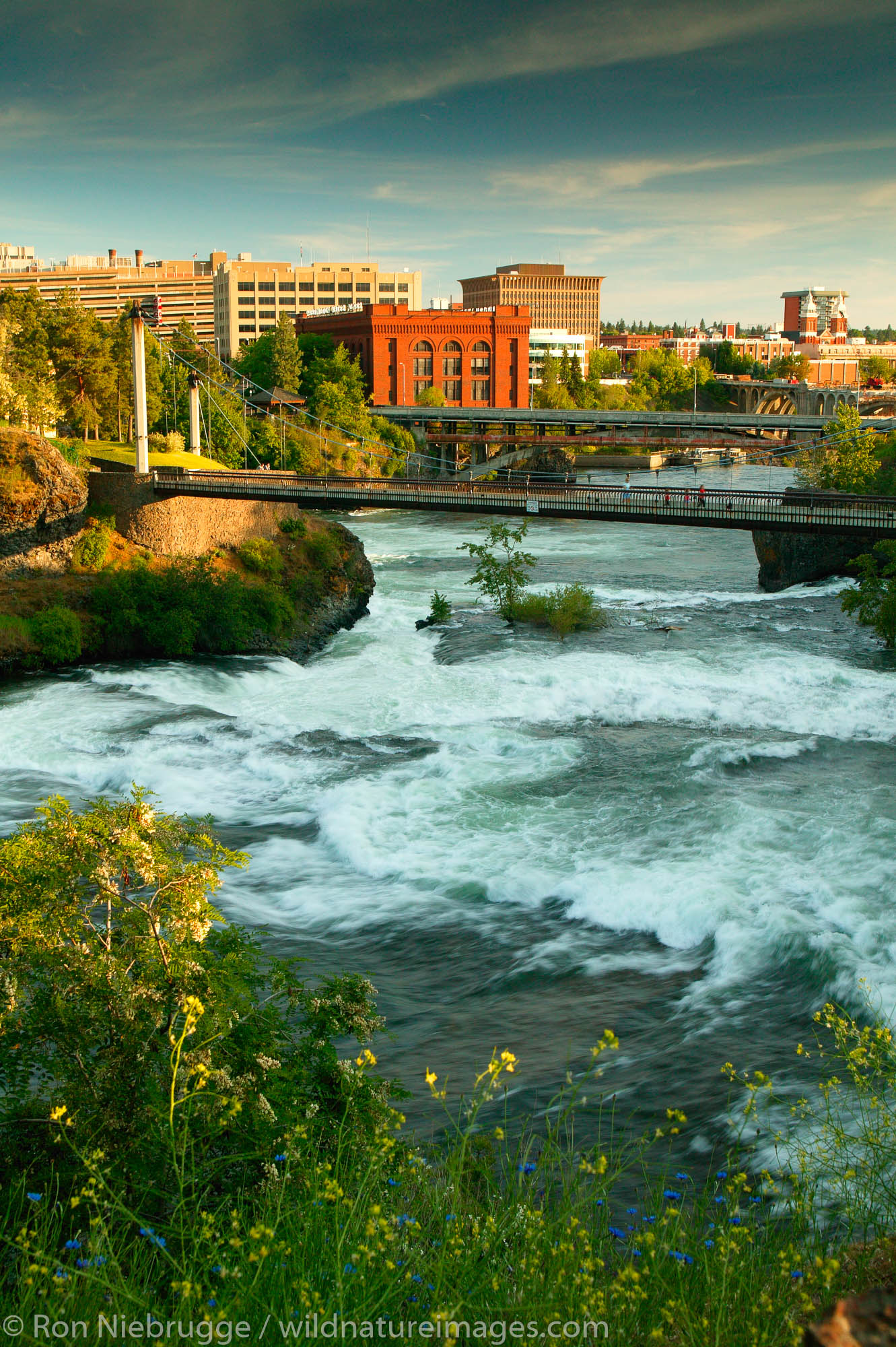 The waterfalls along the Spokane River and Riverfront Park, downtown Spokane, Washington.  Riverfront Park was site of the 1974...
