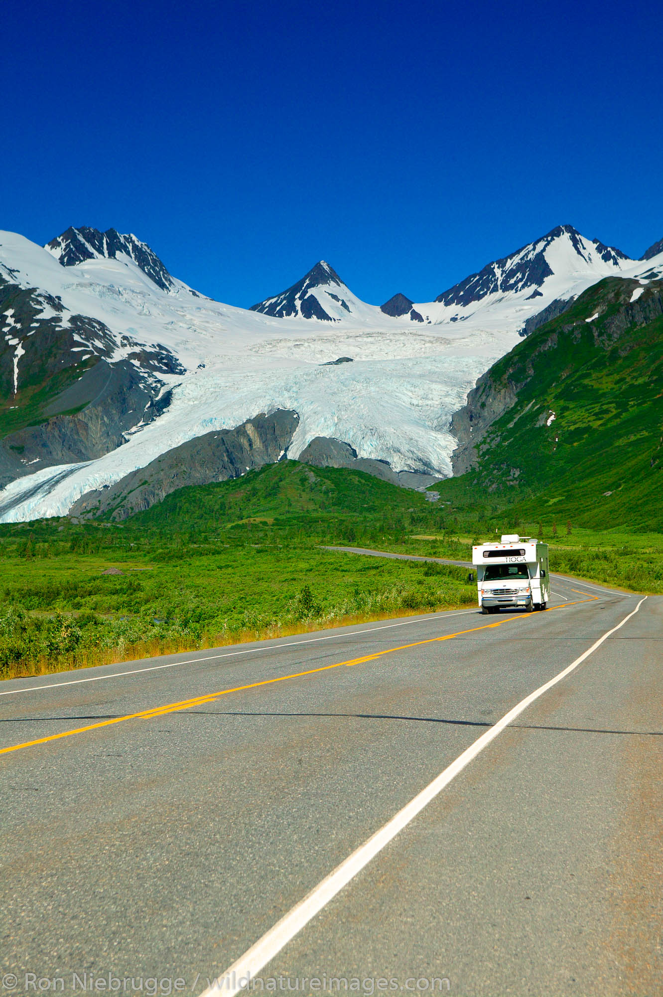 The Richardson Highway travels through she Chugach Mountains as it passes over Thompson Pass on the way to Valdez, Alaska.