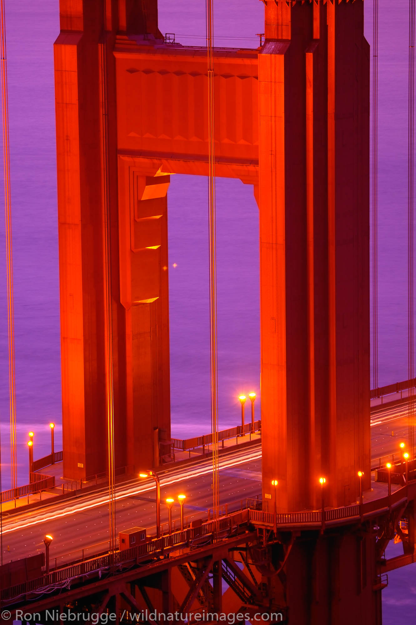 The streaks of lights from autos on the Golden Gate Bridge in the evening, San Francisco, California.