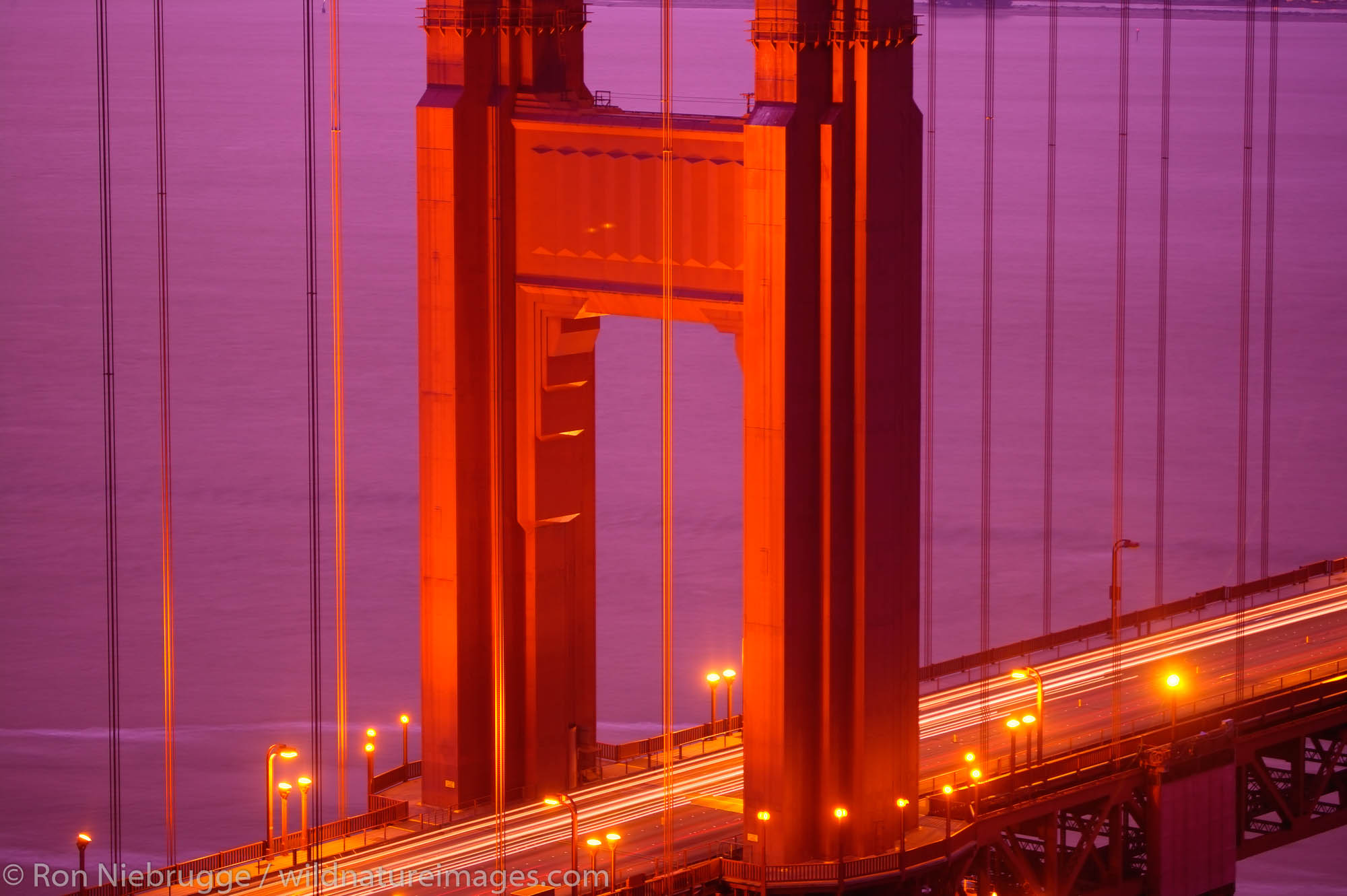 The streaks of lights from autos on the Golden Gate Bridge in the evening, San Francisco, California.