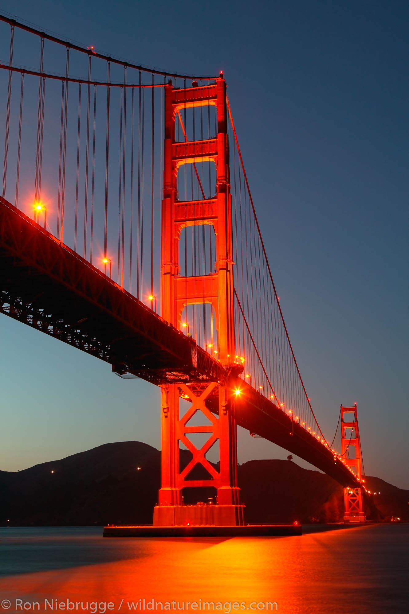 The Golden Gate Bridge from Fort Point in the evening, Presidio, San Francisco, California.