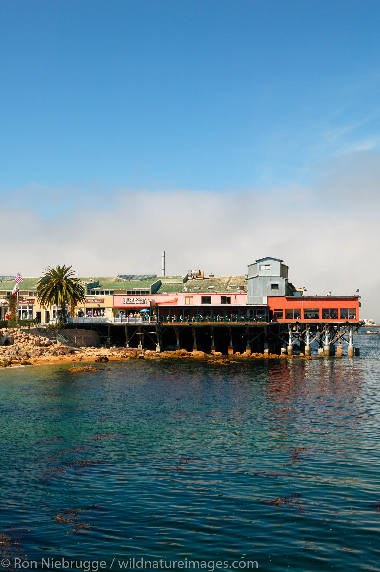 Businesses on a dock along Cannery Row, Monterey, California.