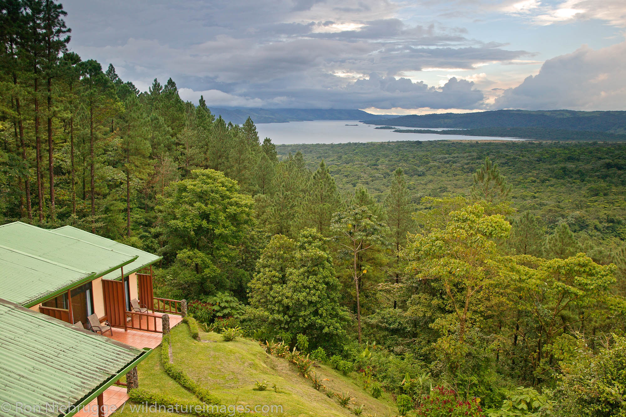 Lake Arenal from the Arenal Observatory Lodge which was originally built by the Smithsonian Institute for scientists to use to...
