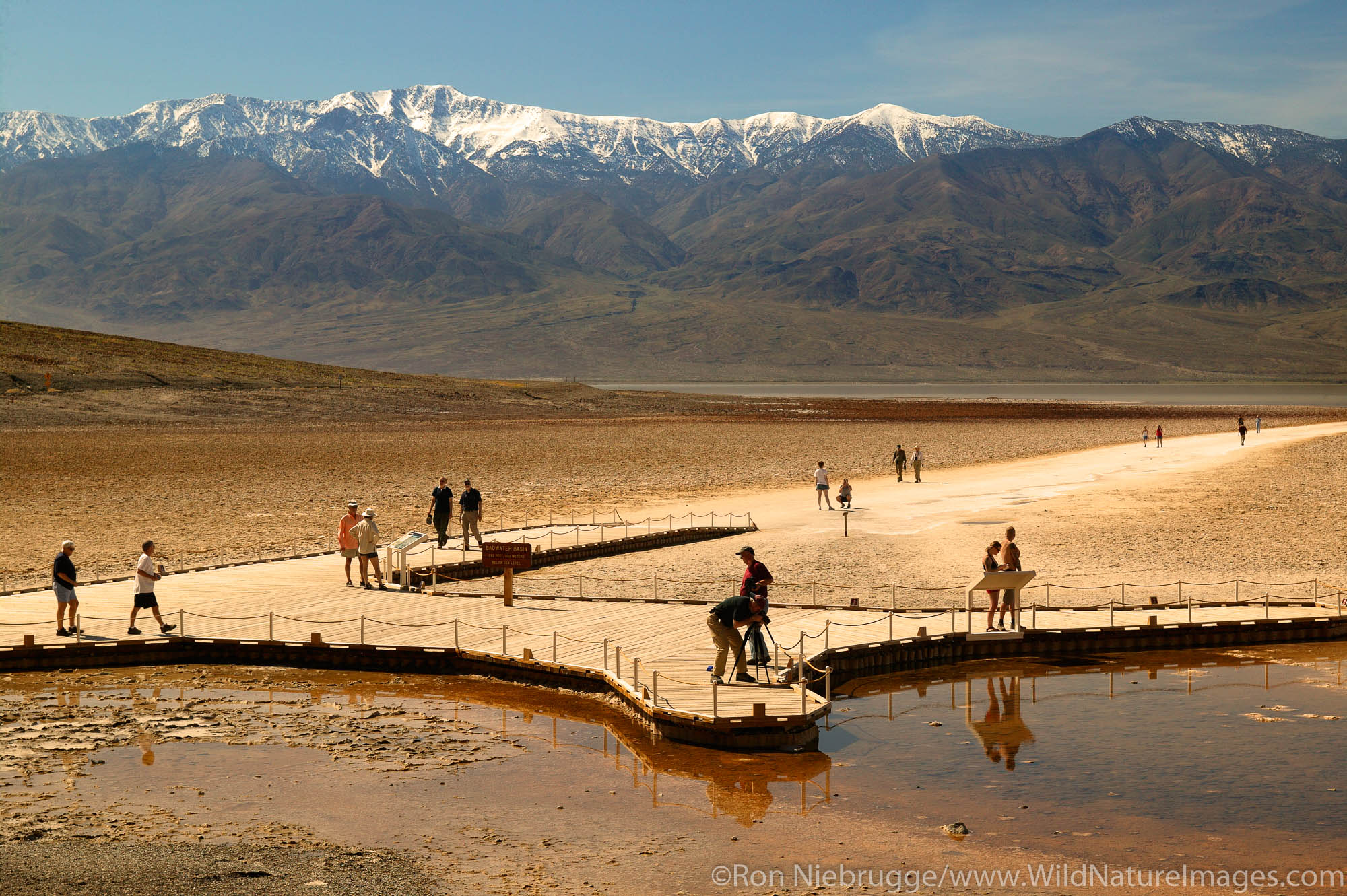 Water from heavy rains fill the Badwater Basin into a lake in 2005.  Death Valley National Park, California.