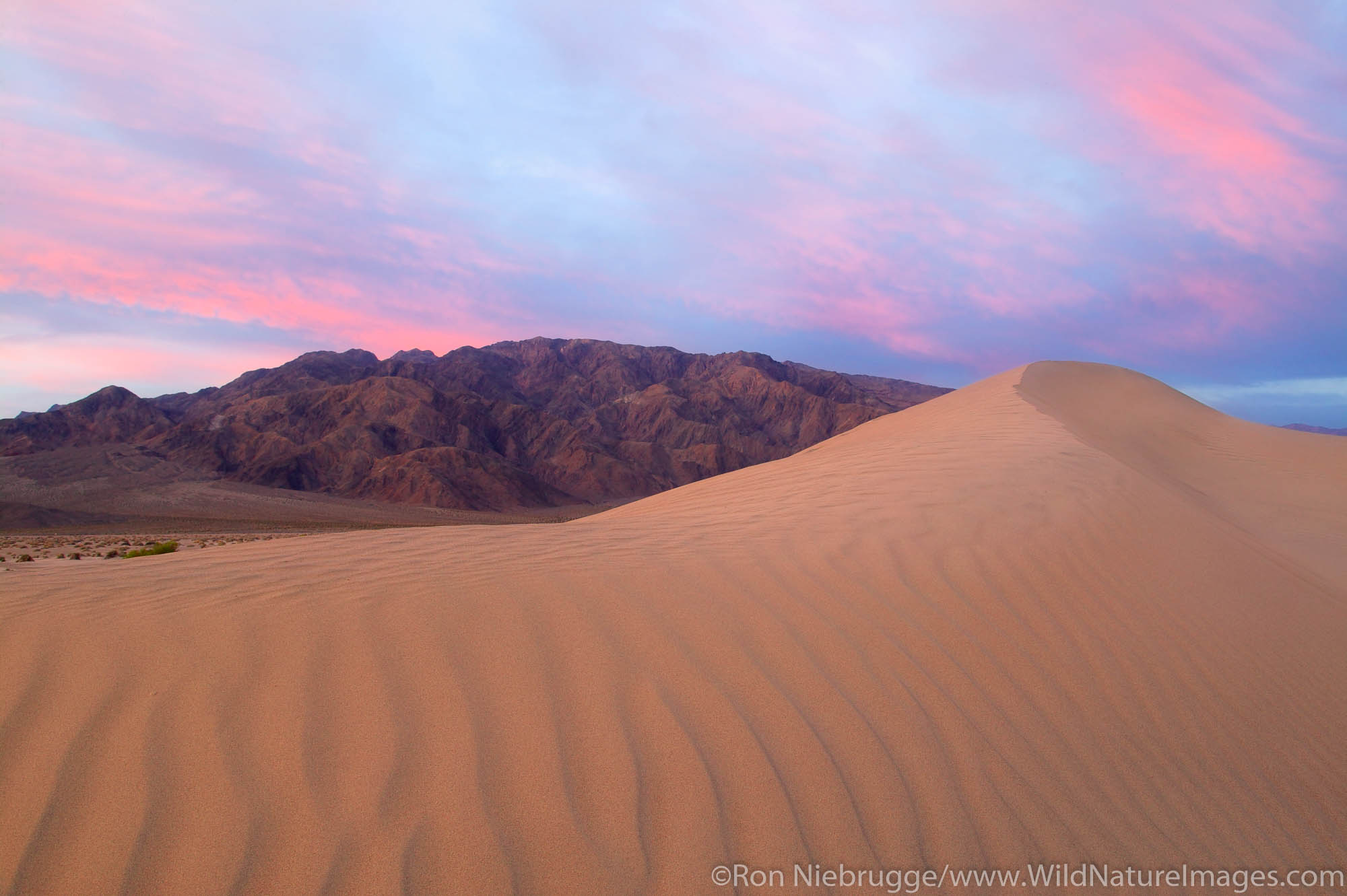 Sand dunes near Stovepipe Wells and Tucki Mountain of the Panamint Range, Death Valley National Park, California.