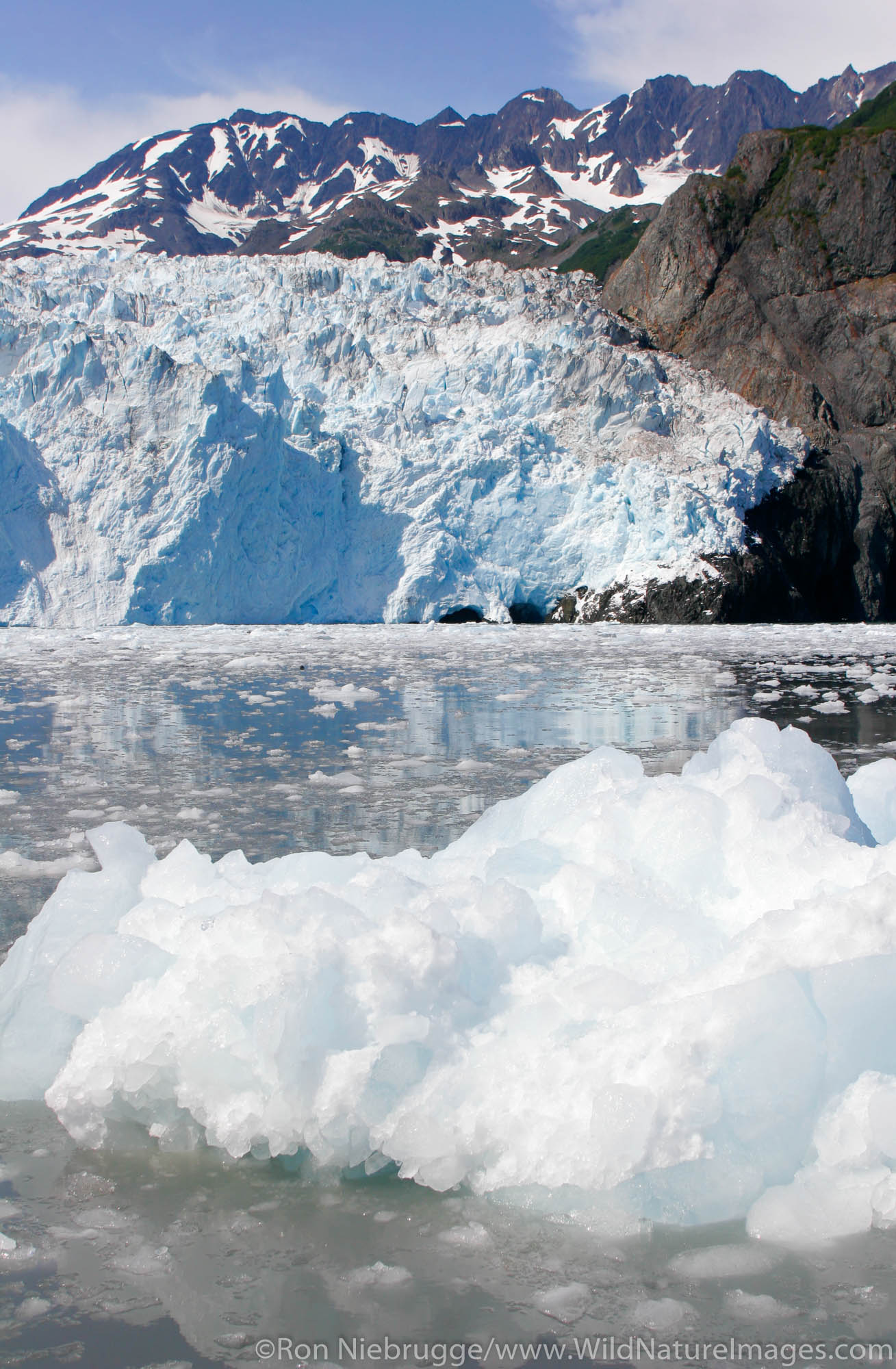 An iceberg in front of Aialik Glacier, Aialik Bay, Kenai Fjords National Park, Alaska.