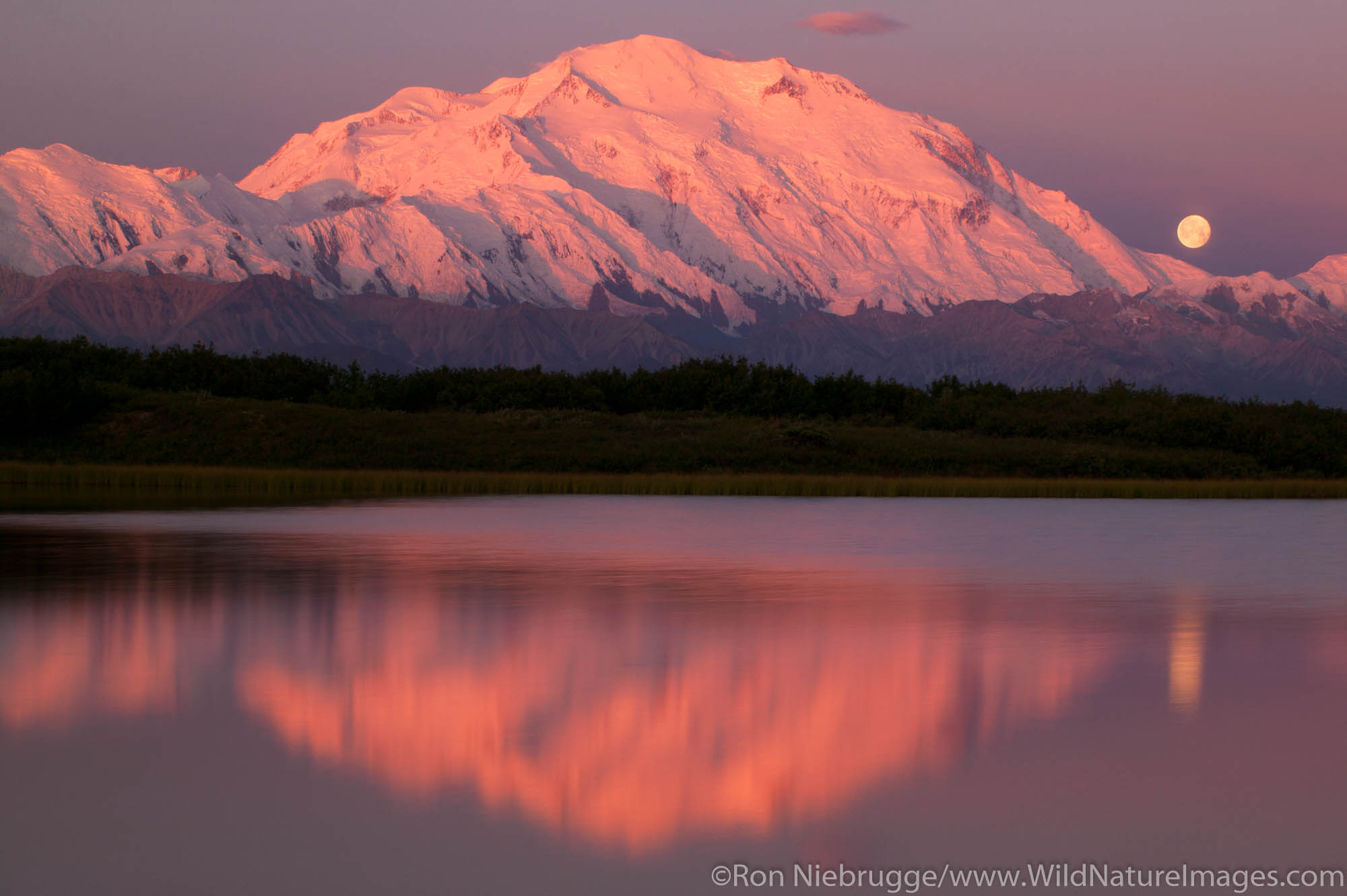 The full moon and Mt. McKinley from Reflection Pond, Denali National Park, Alaska.