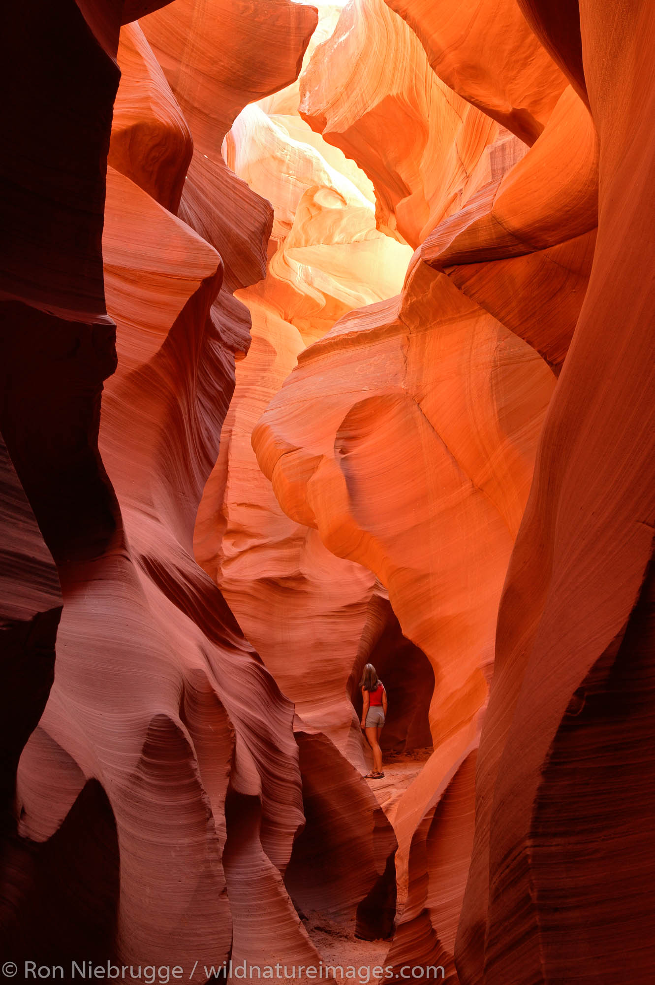 A visitor to the Lower Antelope Canyon, near Page, Arizona. (model released)