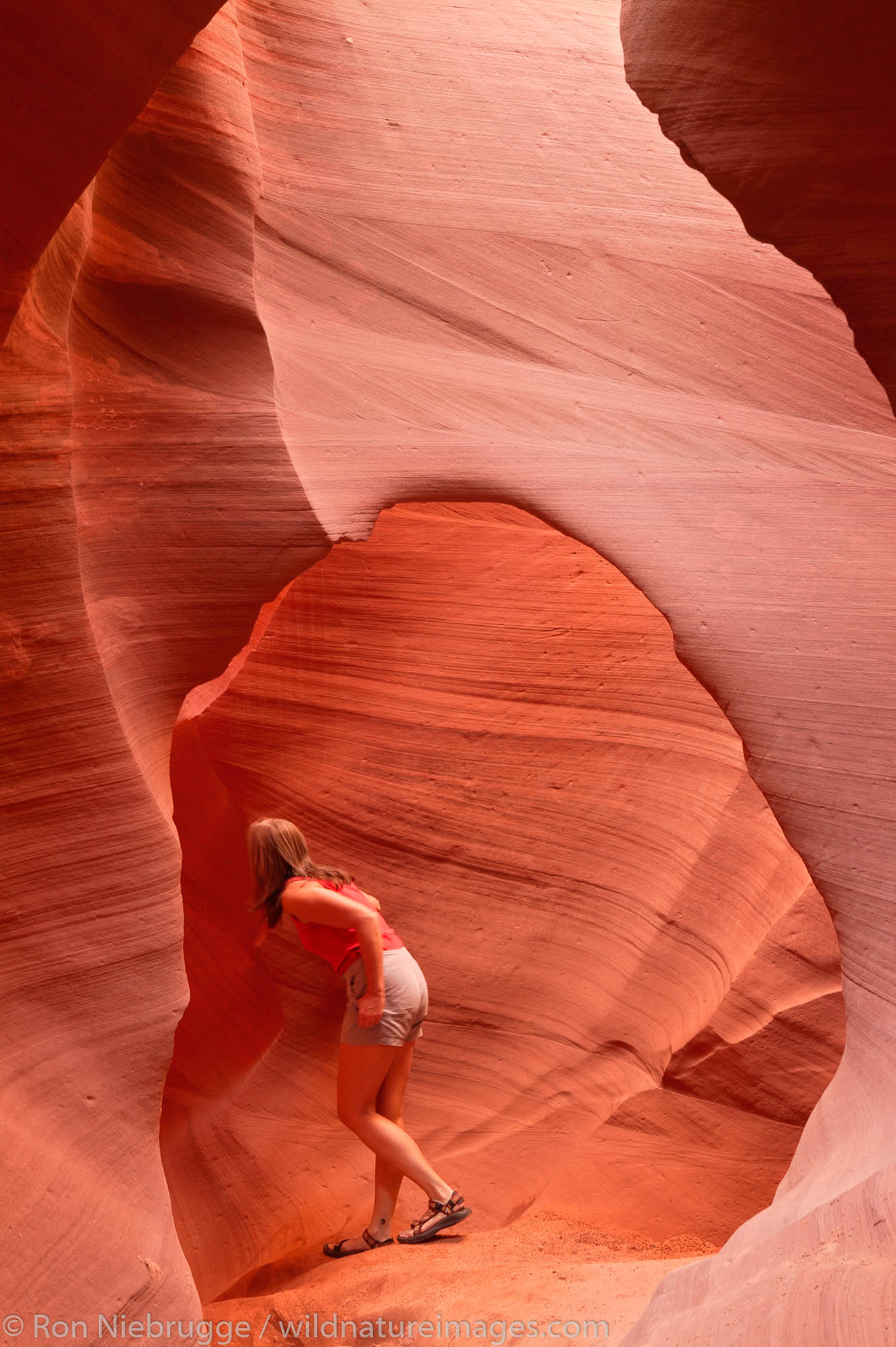 A visitor to the Lower Antelope Canyon, near Page, Arizona. (model released)