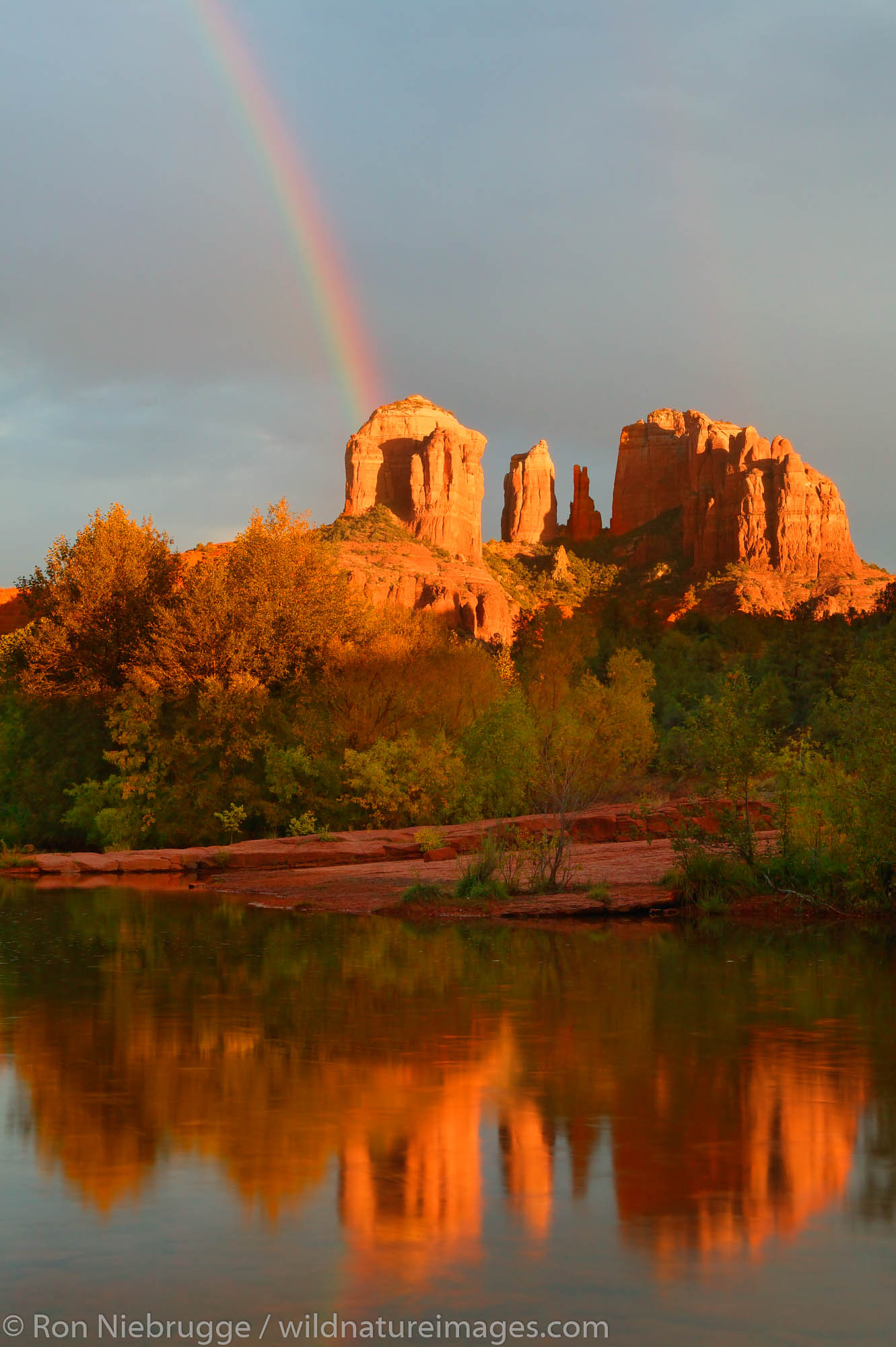 A rainbow over Cathedral Rock and Oak Creek, Sedona, Arizona.