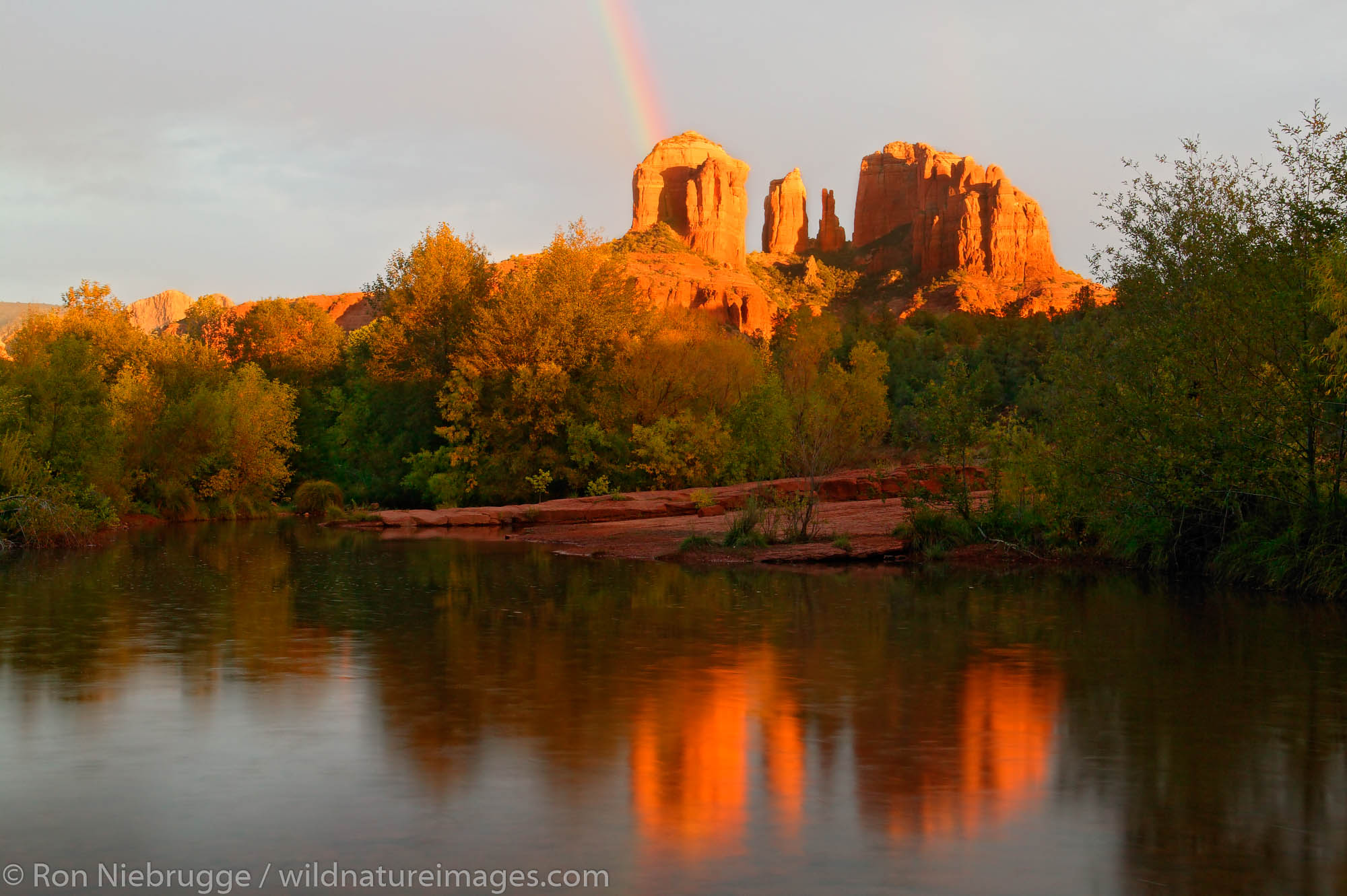 A rainbow over Cathedral Rock and Oak Creek, Sedona, Arizona.