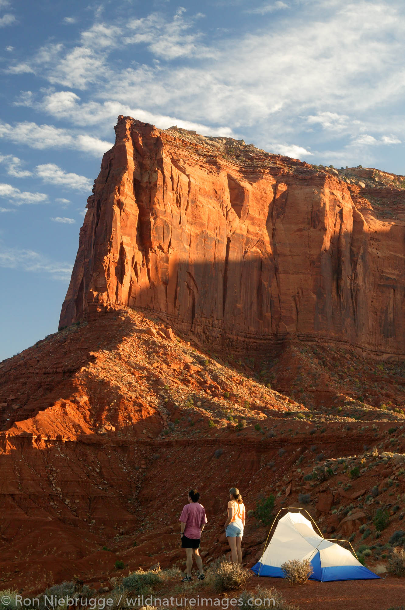 A visitor enjoys the view from camp of Monument Valley Navajo Tribal Park, Utah.  (model released)