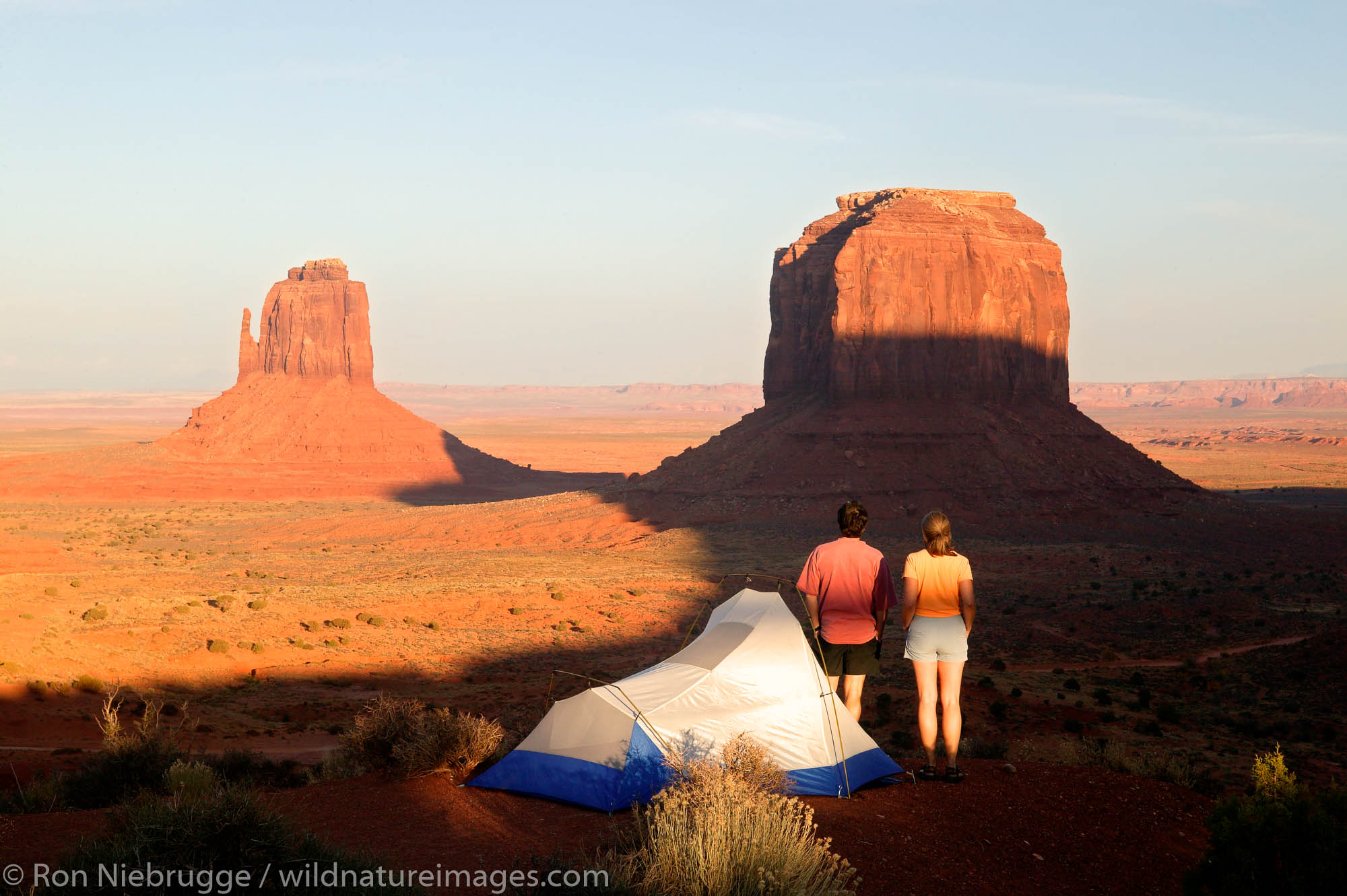 A visitor enjoys the view from camp of Monument Valley Navajo Tribal Park, Utah.  (model released)