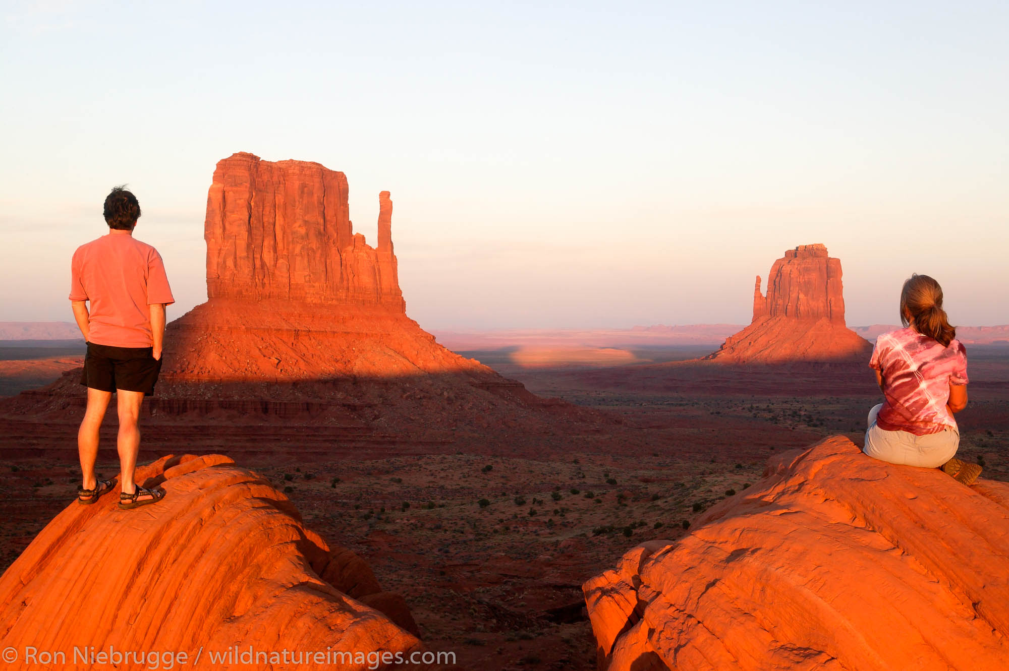 A visitors enjoy the view of Monument Valley Navajo Tribal Park, Utah.  (Model released)