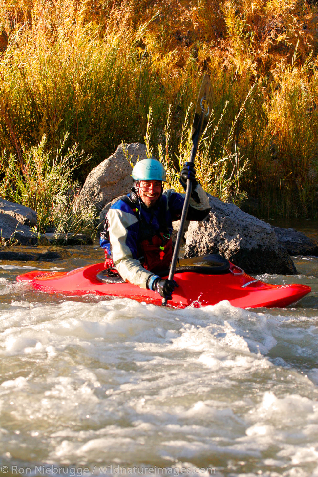 Photographer and adventurer John Fullbright kayaking on the Rio Grande river near Taos, New Mexico.