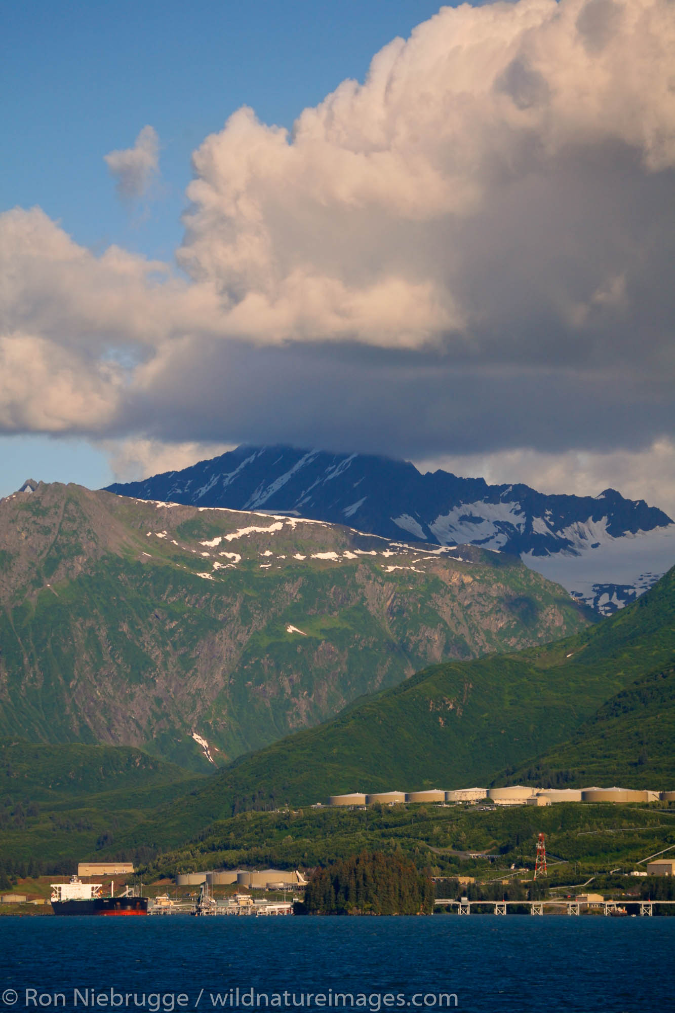 An Oil Tanker ship at the Port Valdez and the Trans-Alaska Pipeline Terminal, Prince William Sound, Valdez, Alaska.