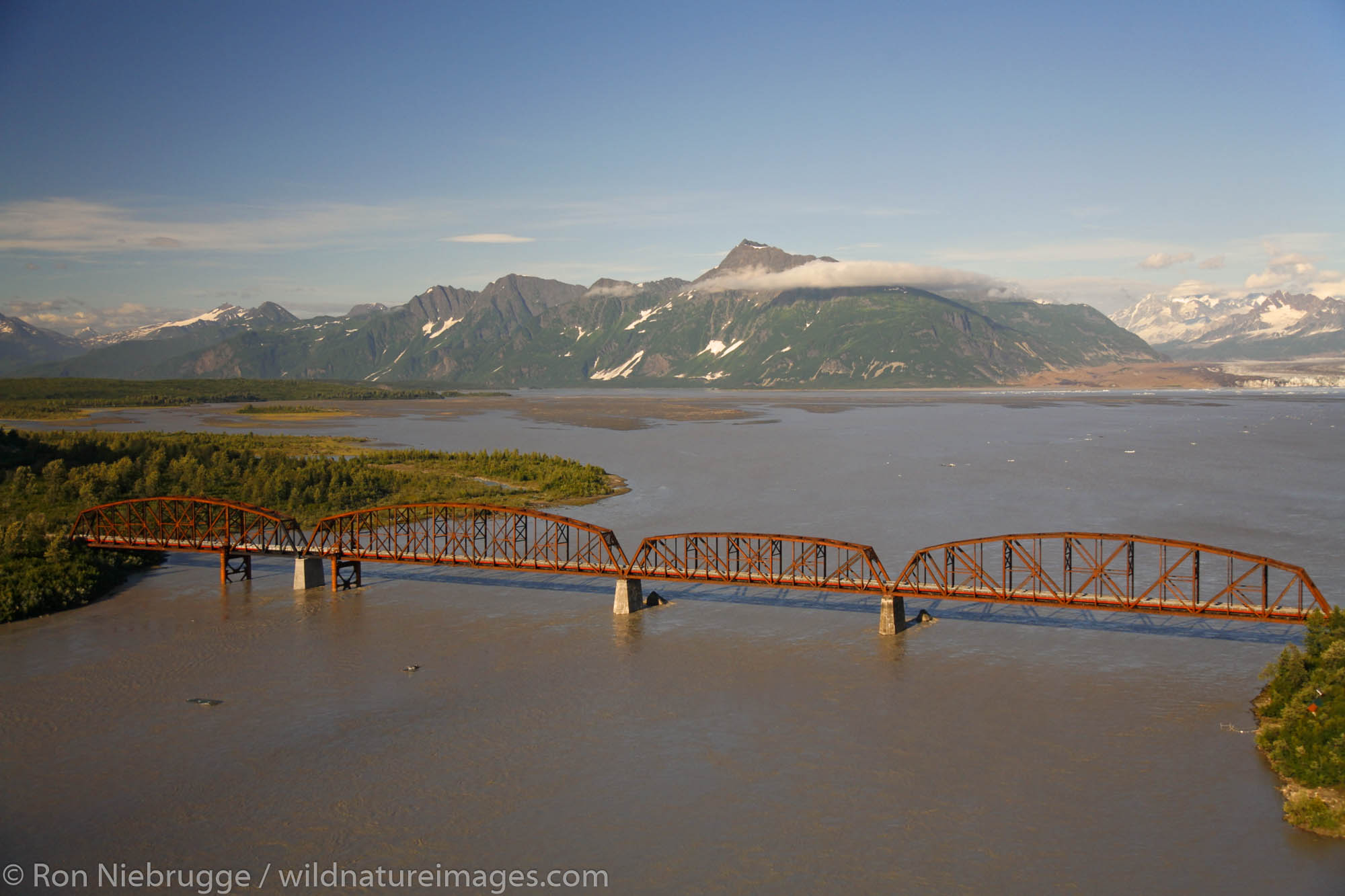 Aerial Million Dollar Bridge crossing the Copper River with Miles Lake in the background, Chugach National Forest near Cordova...