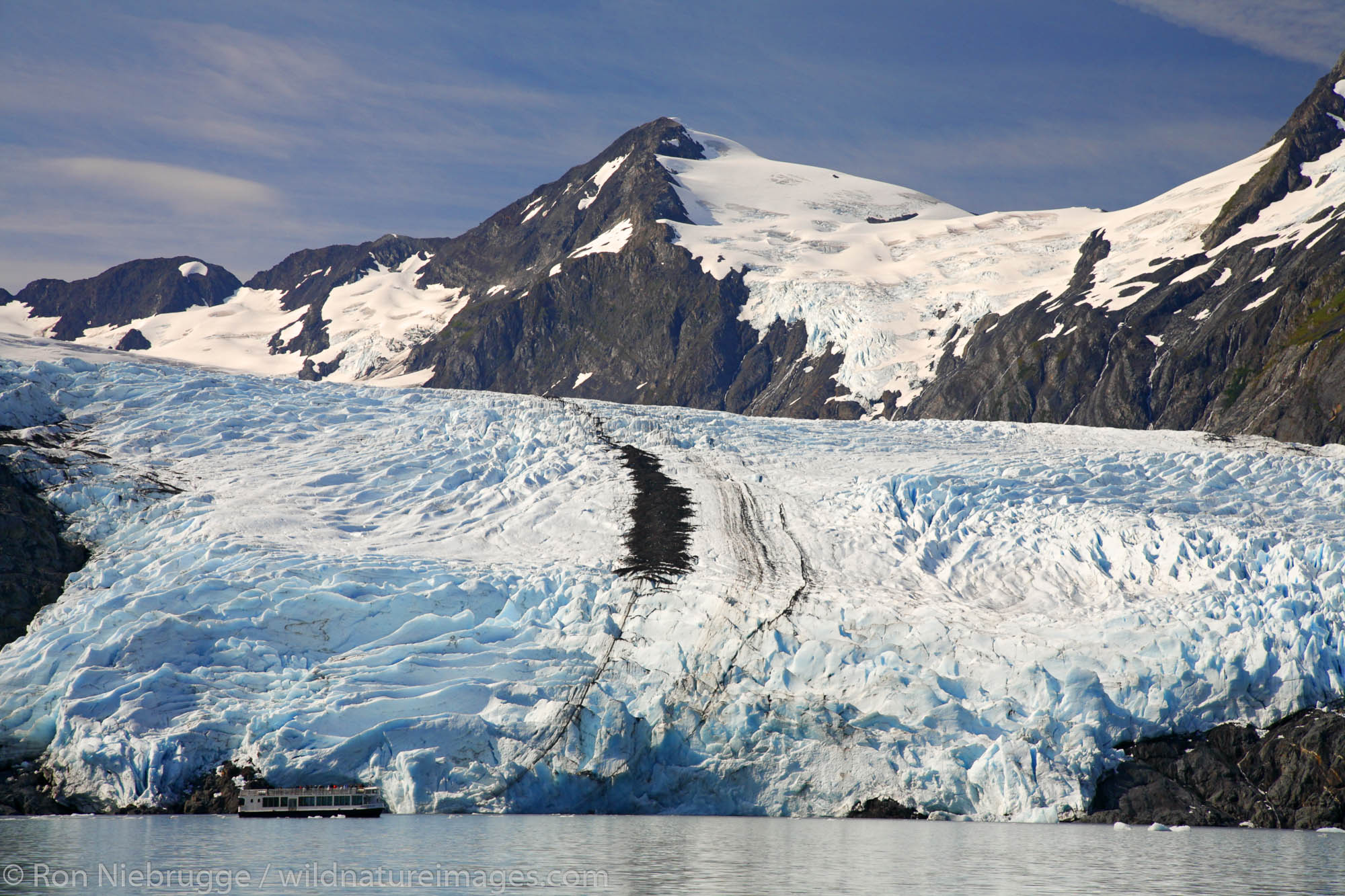 M/V Ptarmigan passes in front of Portage Glacier on Portage Lake Chugach National Forest Alaska.