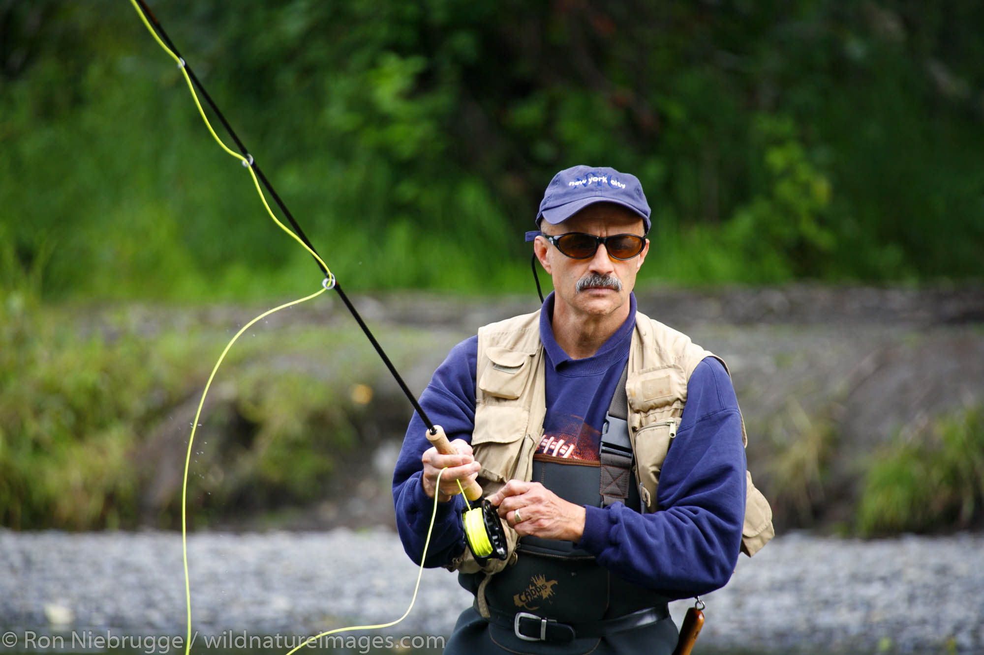 Fishing on the Russian River, Kenai Peninsula, Chugach National Forest, Alaska. (MR)