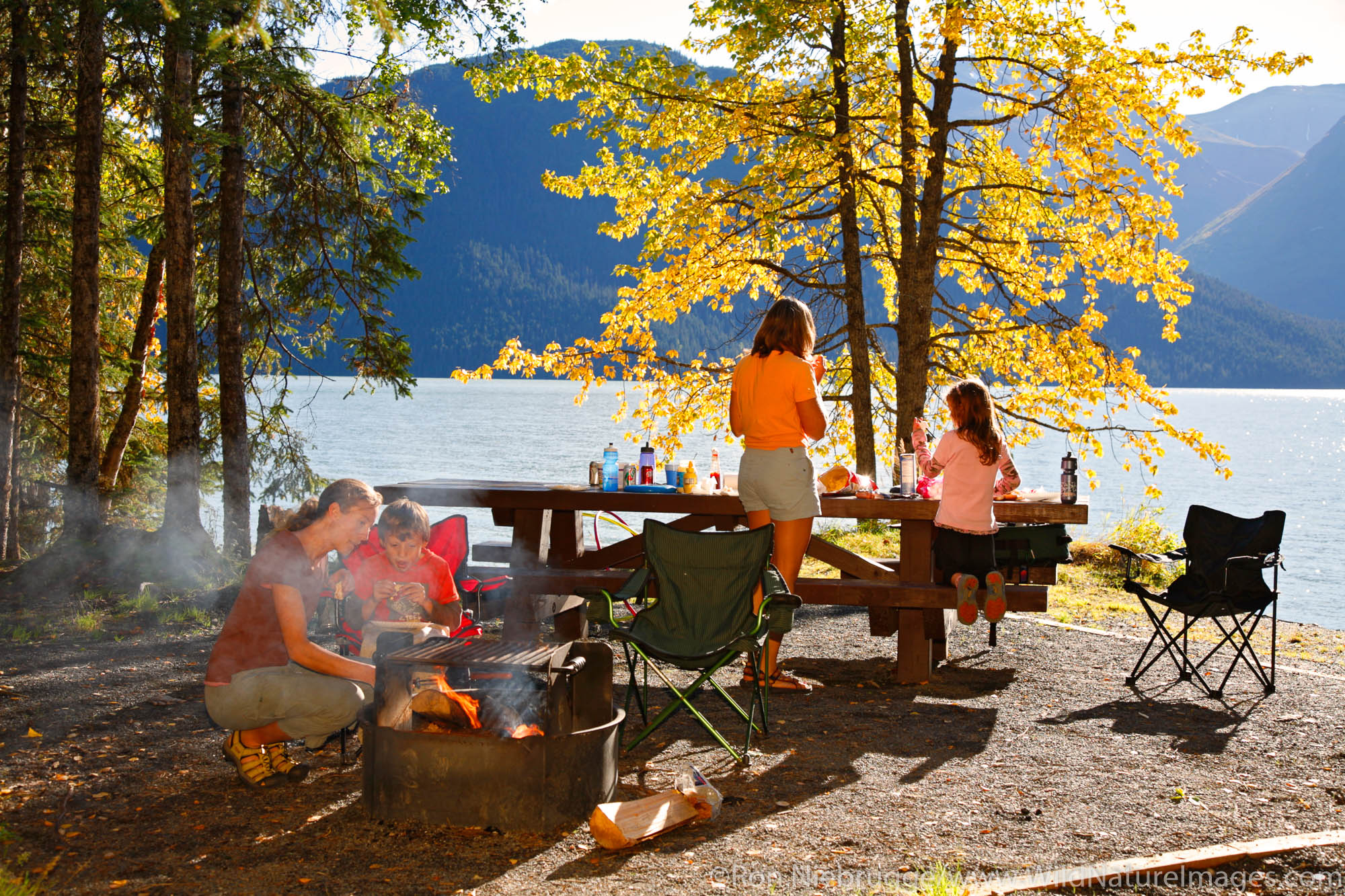 Roasting marshmallows during family picnic at Trail Lake Campground, Kenai Peninsula, Chugach National Forest, Alaska. (MR)