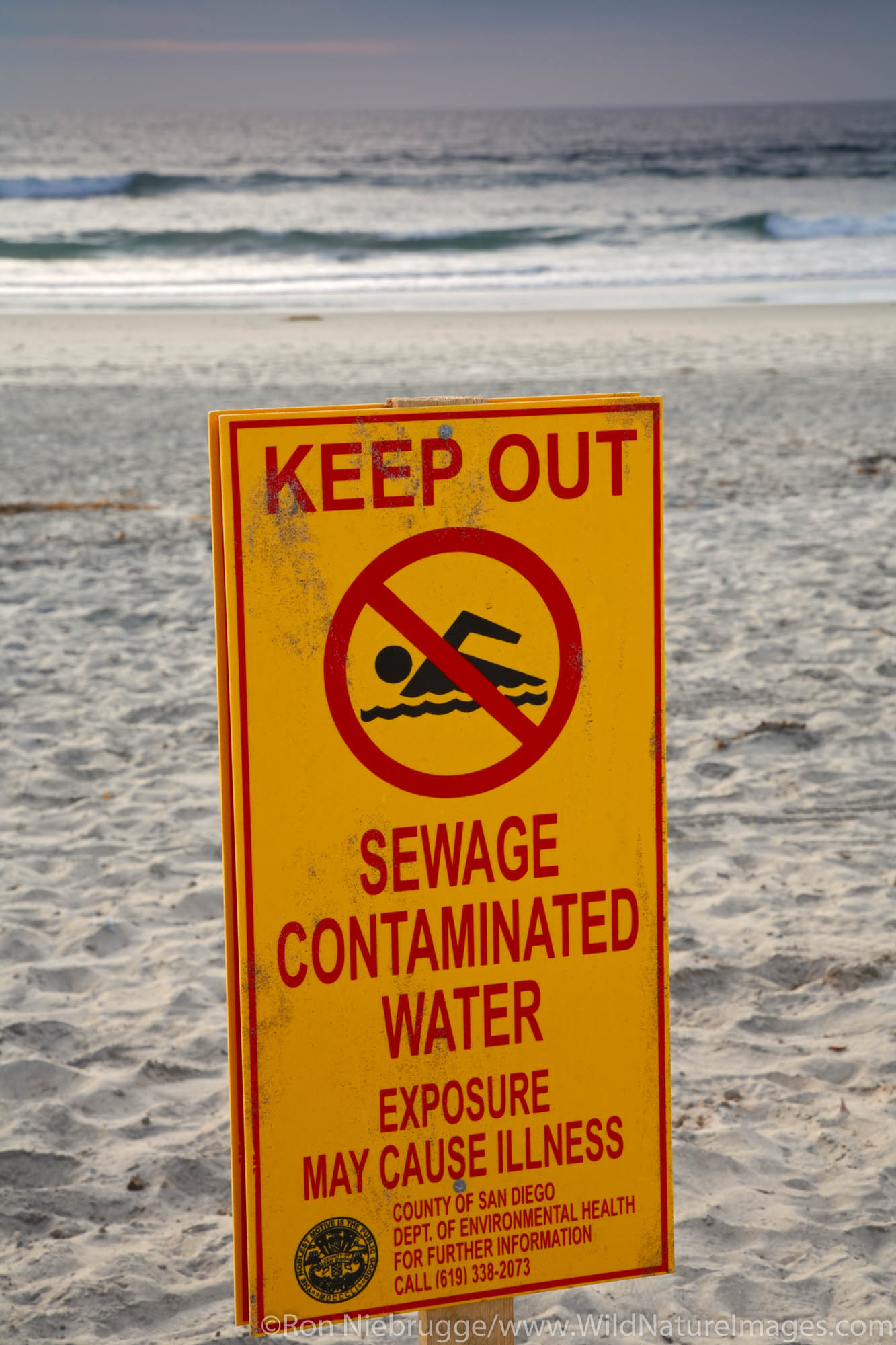 Contaminated water sign at Imperial Beach Municipal Pier, San Diego County, California.