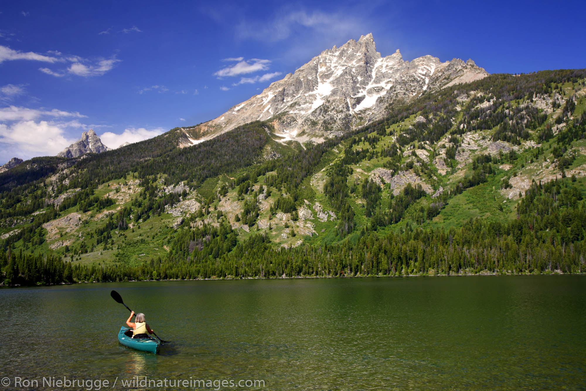 Kayaking on Jenny Lake, Grand Teton National Park, Wyoming. (MR)