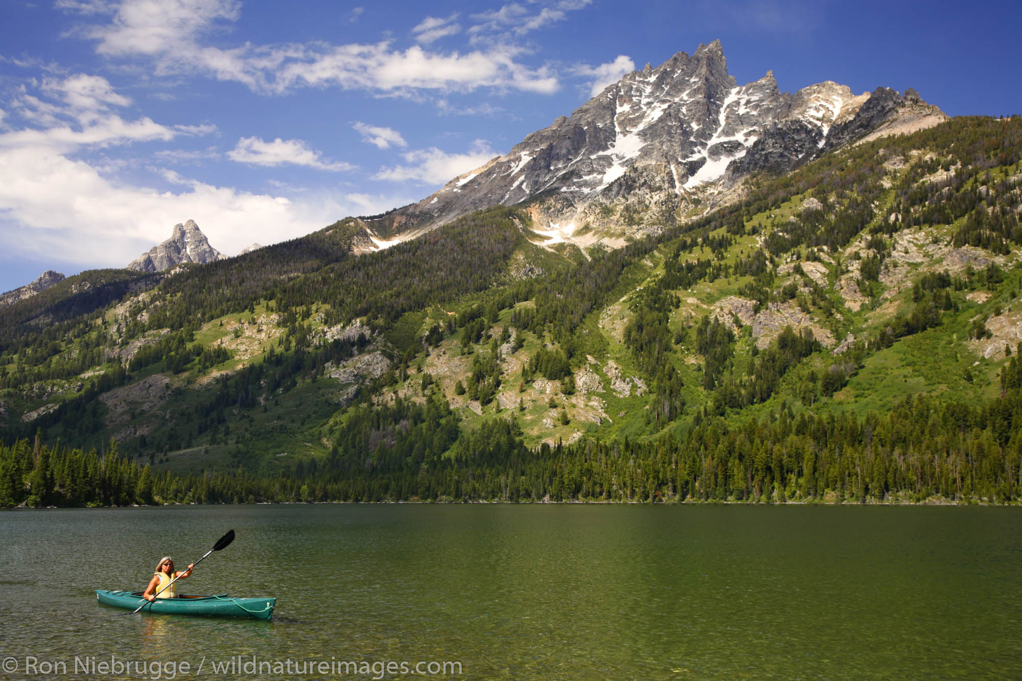 Kayaking on Jenny Lake, Grand Teton National Park, Wyoming. (MR)