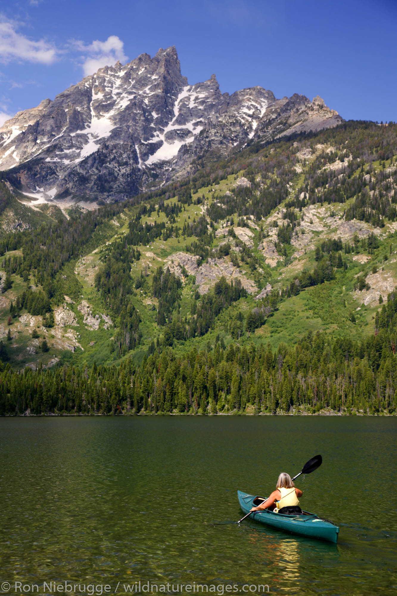 Kayaking on Jenny Lake, Grand Teton National Park, Wyoming. (MR)