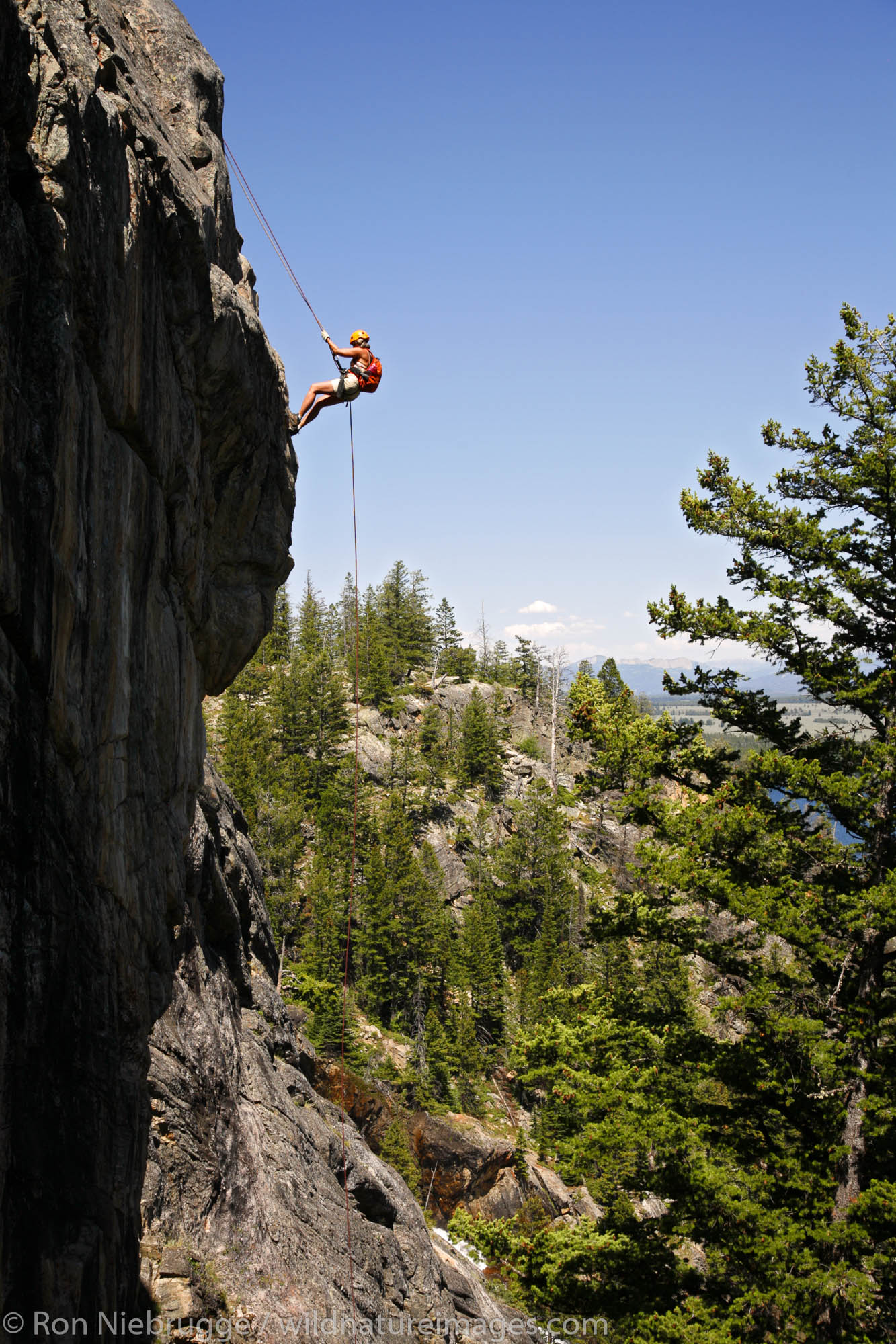 Rock climbing near Hidden Falls with Exum Mountain Guides, Grand Teton National Park, Wyoming. (MR)