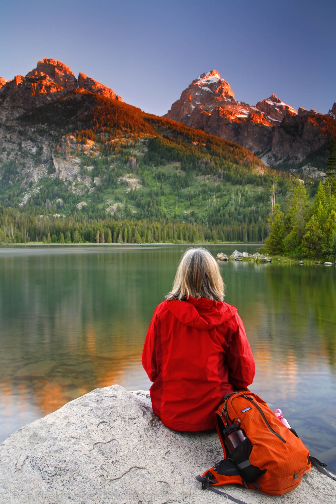 A hiker at Taggart Lake, Grand Teton National Park, Wyoming. (Model Released)