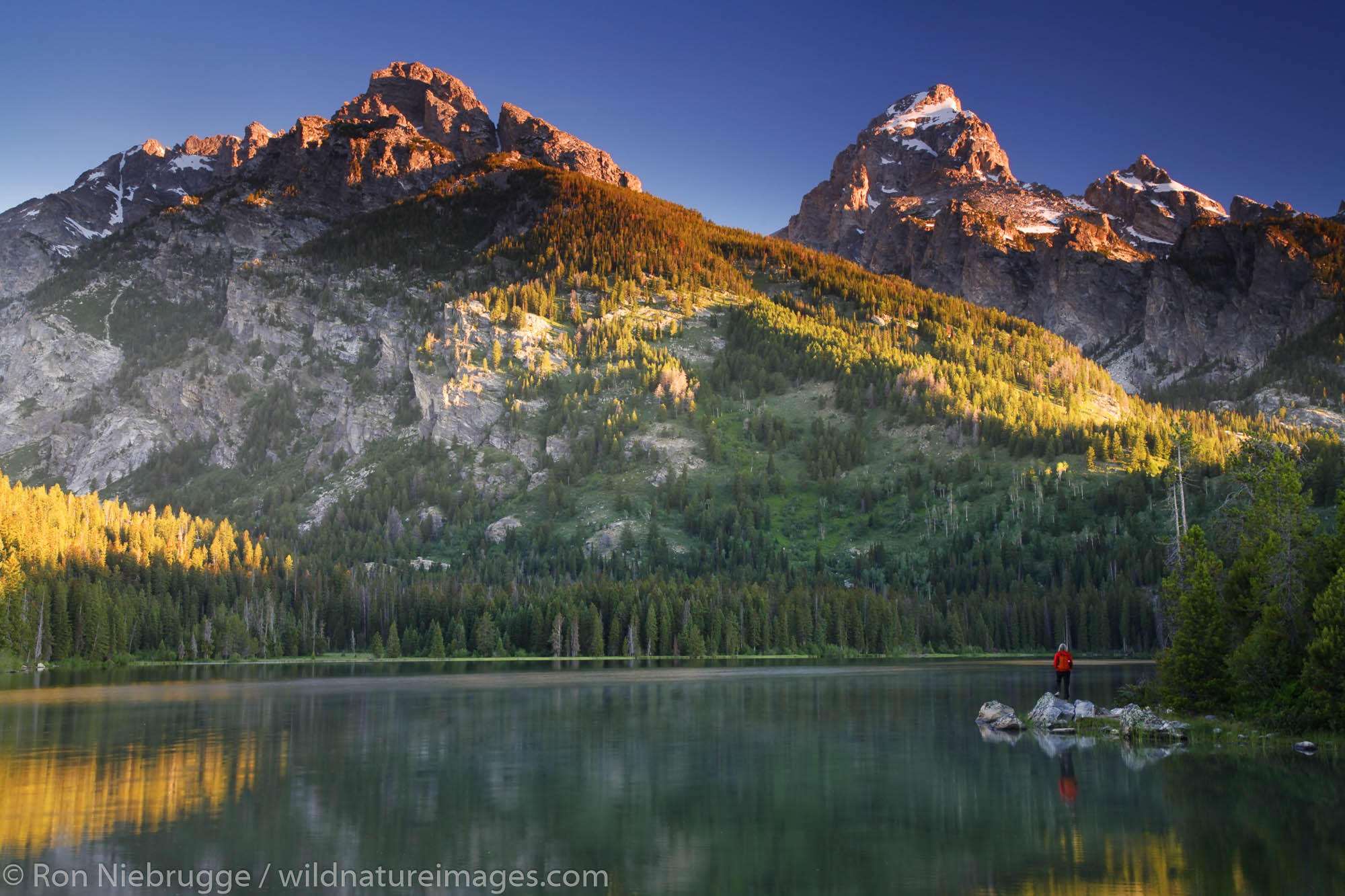 A hiker at Taggart Lake, Grand Teton National Park, Wyoming. (Model Released)