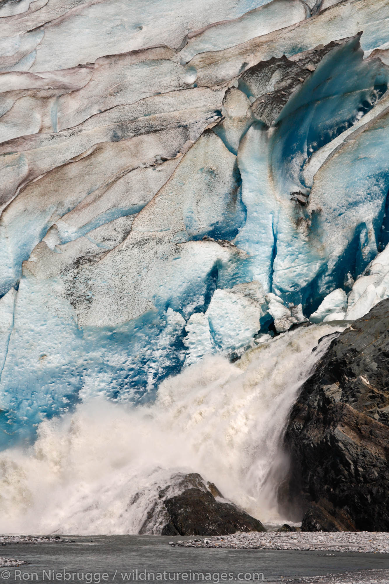 Water rushes from Mendenhall Glacier and into Mendenhall Lake, Juneau, Alaska.