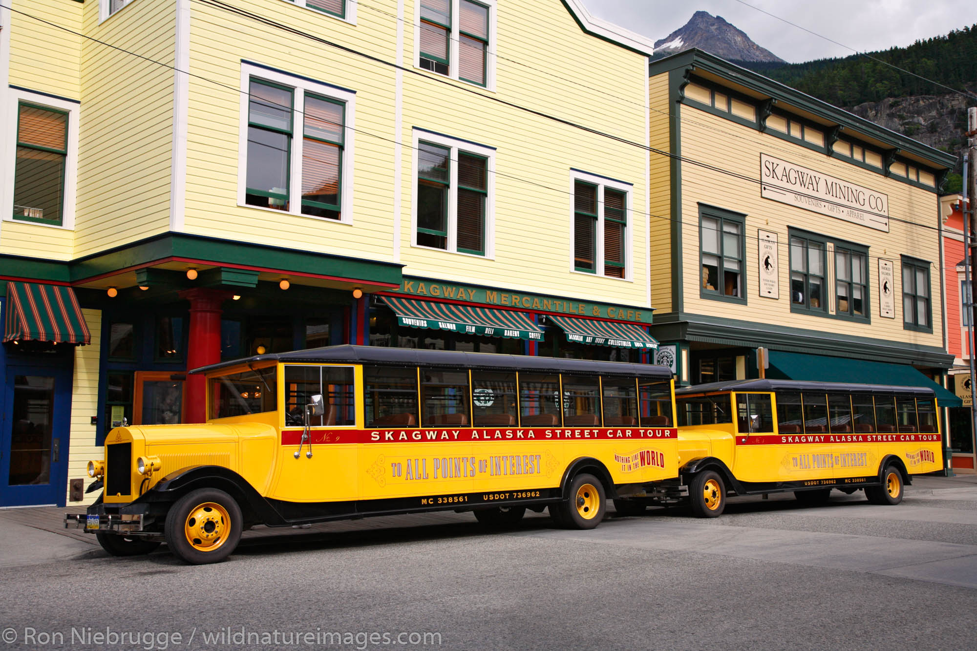 Old tour buses in historic downtown Skagway, Alaska.