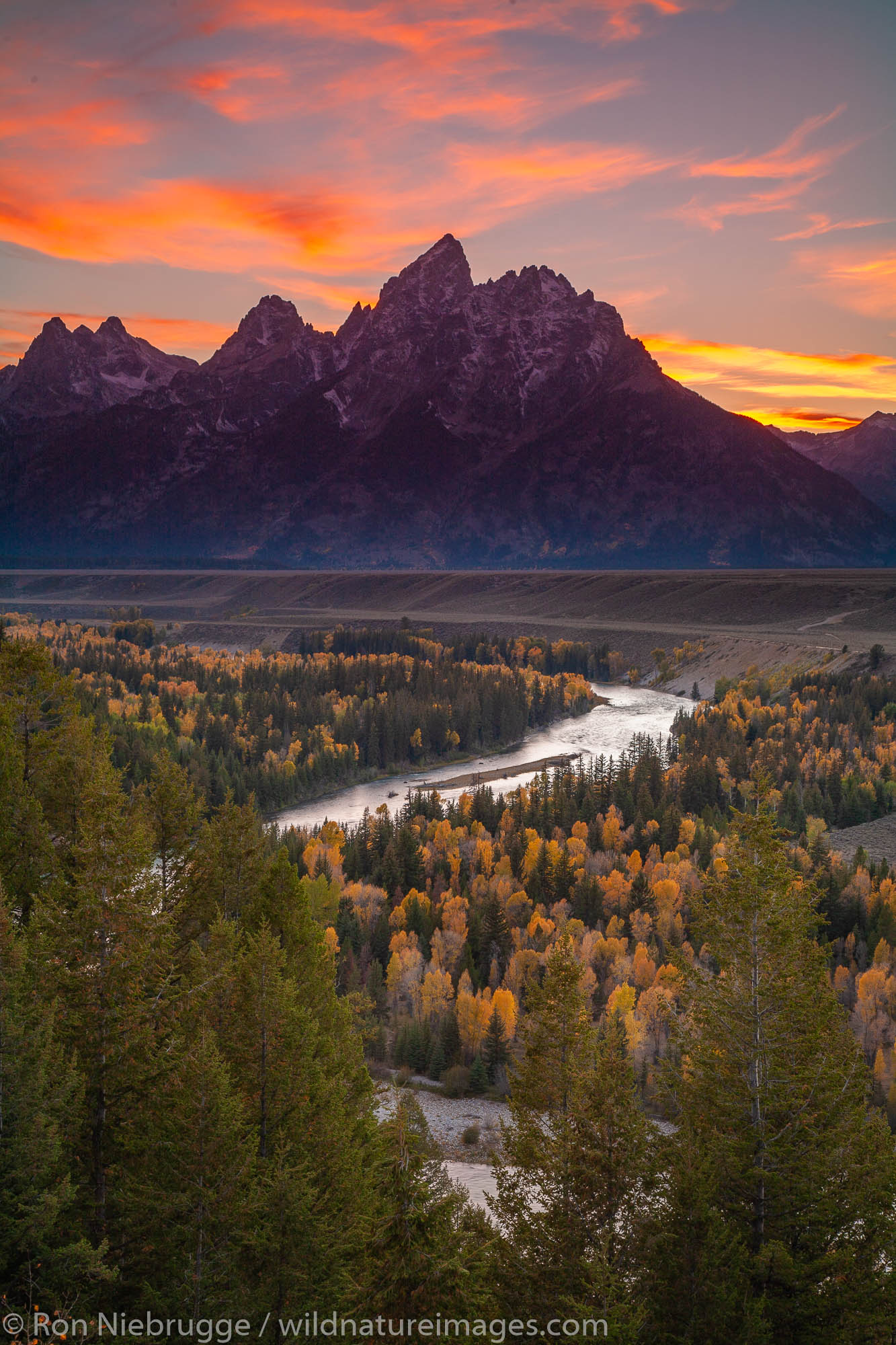 Grand Teton and the Snake River during Fall in the Grand Teton National Park, Wyoming.