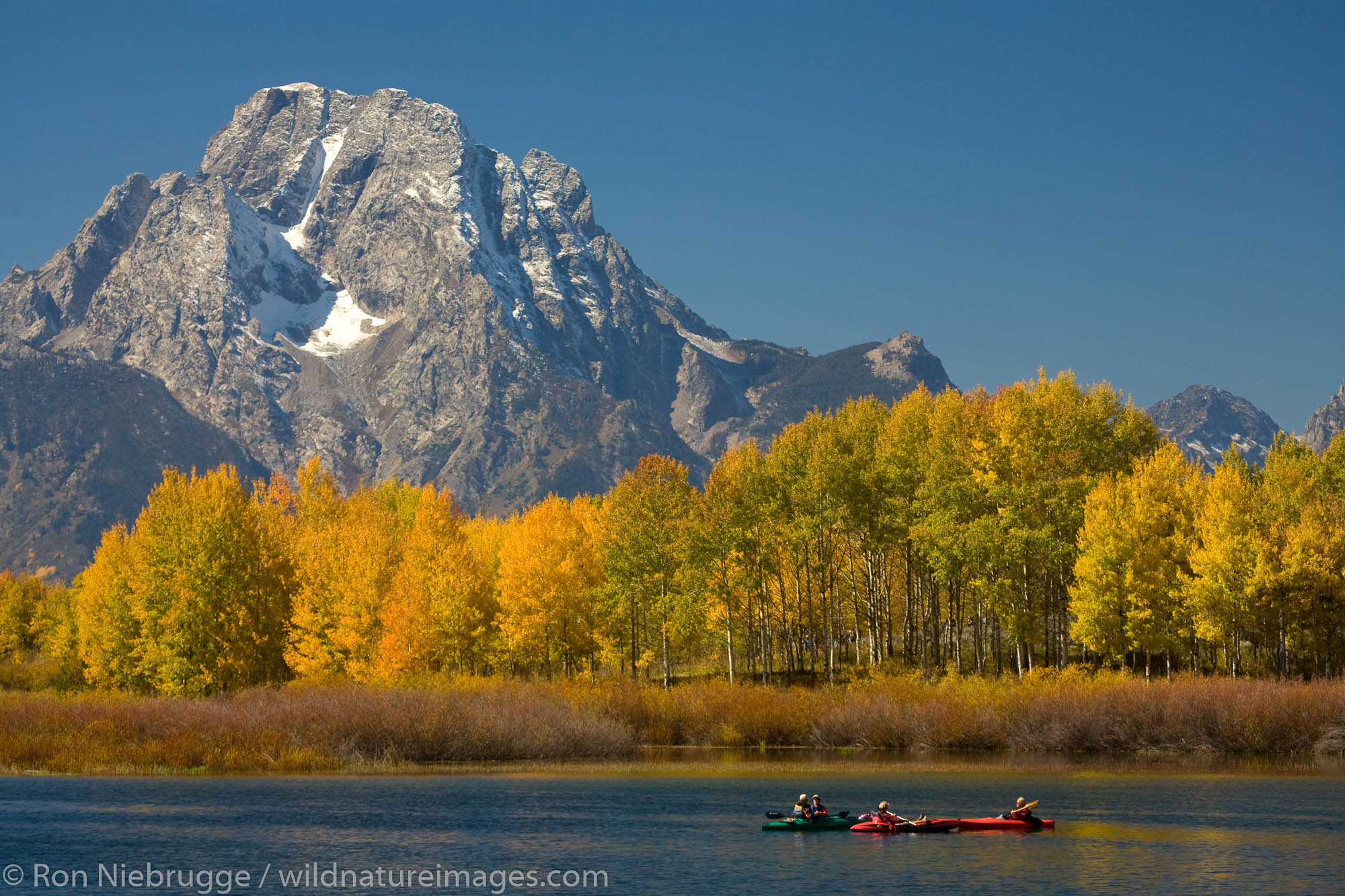 Kayakers and Mount Moran from Oxbow Bend, Grand Teton National Park, Wyoming.