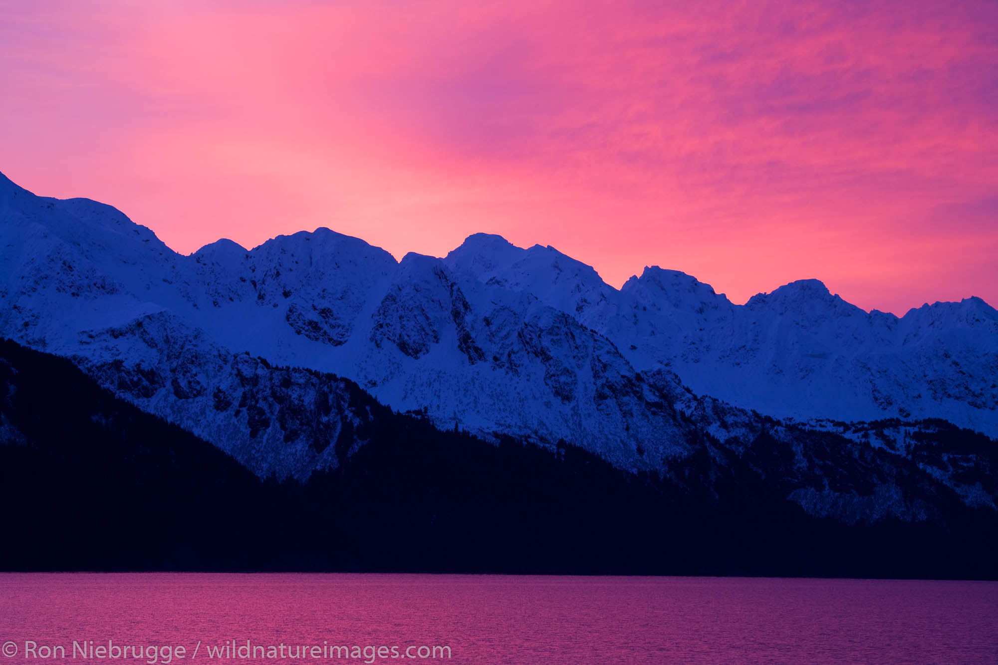 Sunrise over Resurrection Bay and Chugach Mountains, Seward, Alaska.