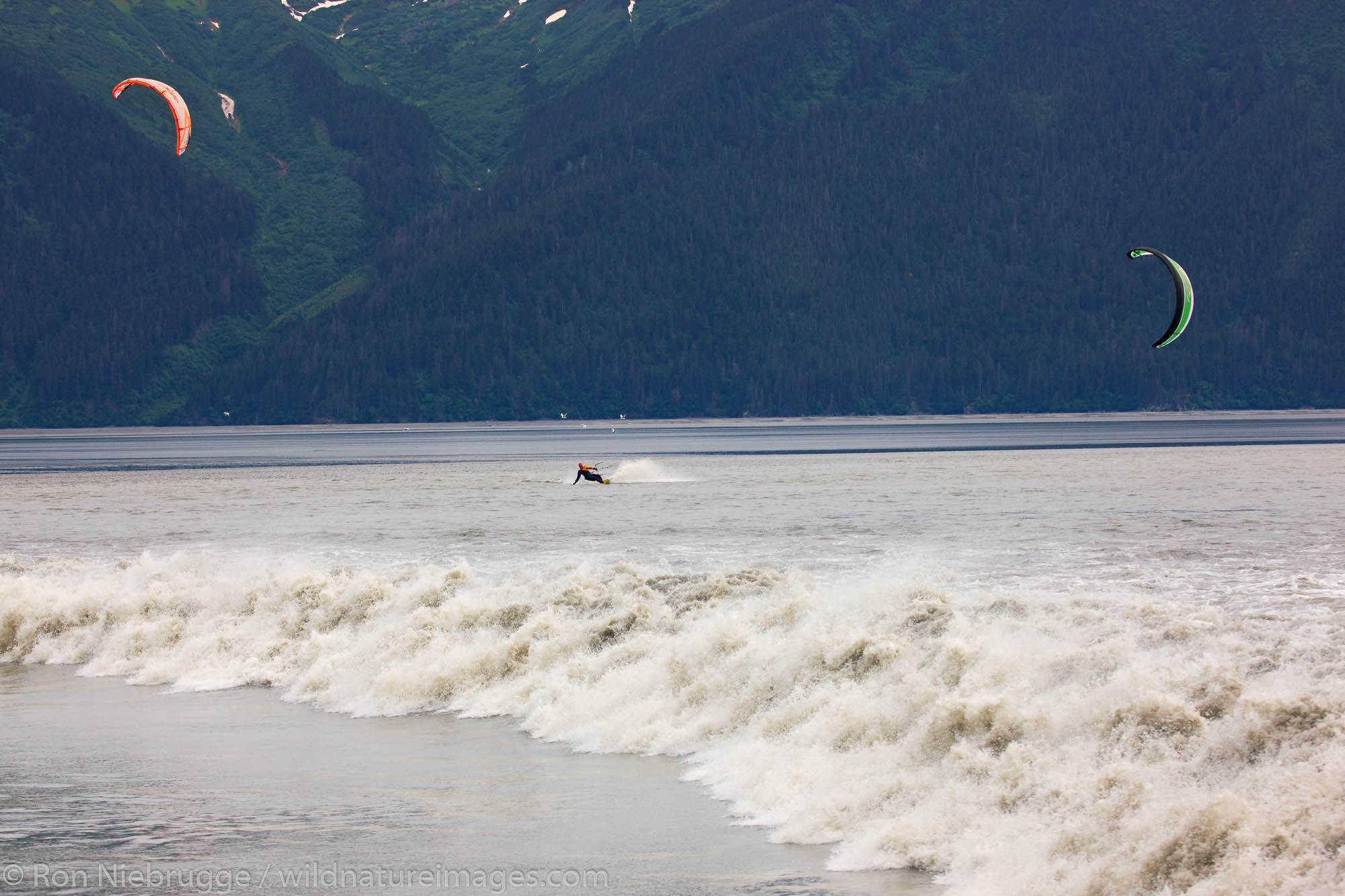 Troy and Mark kiteboarding the Bore Tide on Turnagain Arm, near Anchorage, Alaska.