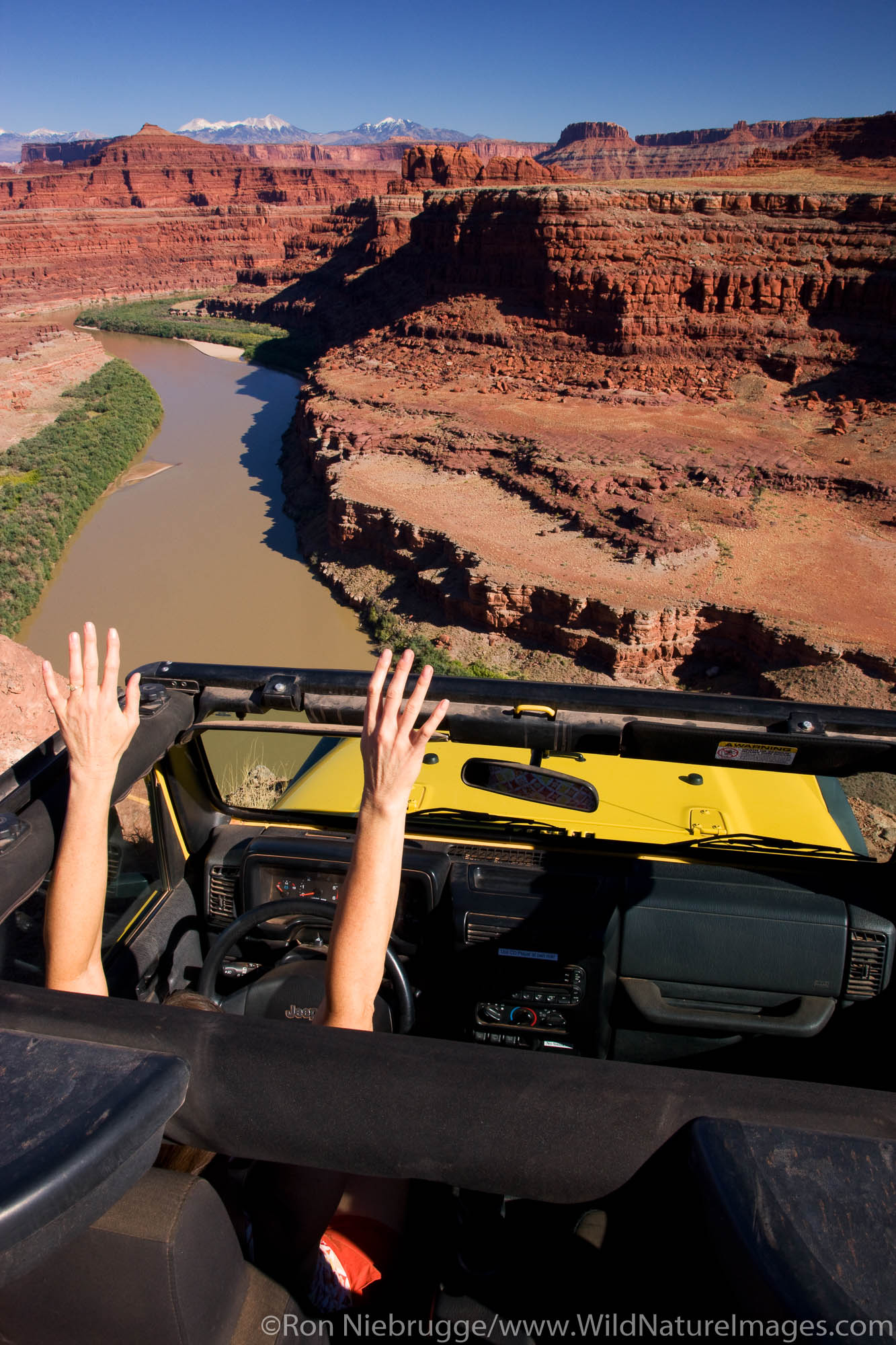 A jeep at Thelma and Louise Point, near Island in the Sky District, Canyonlands National Park, Moab, Utah.