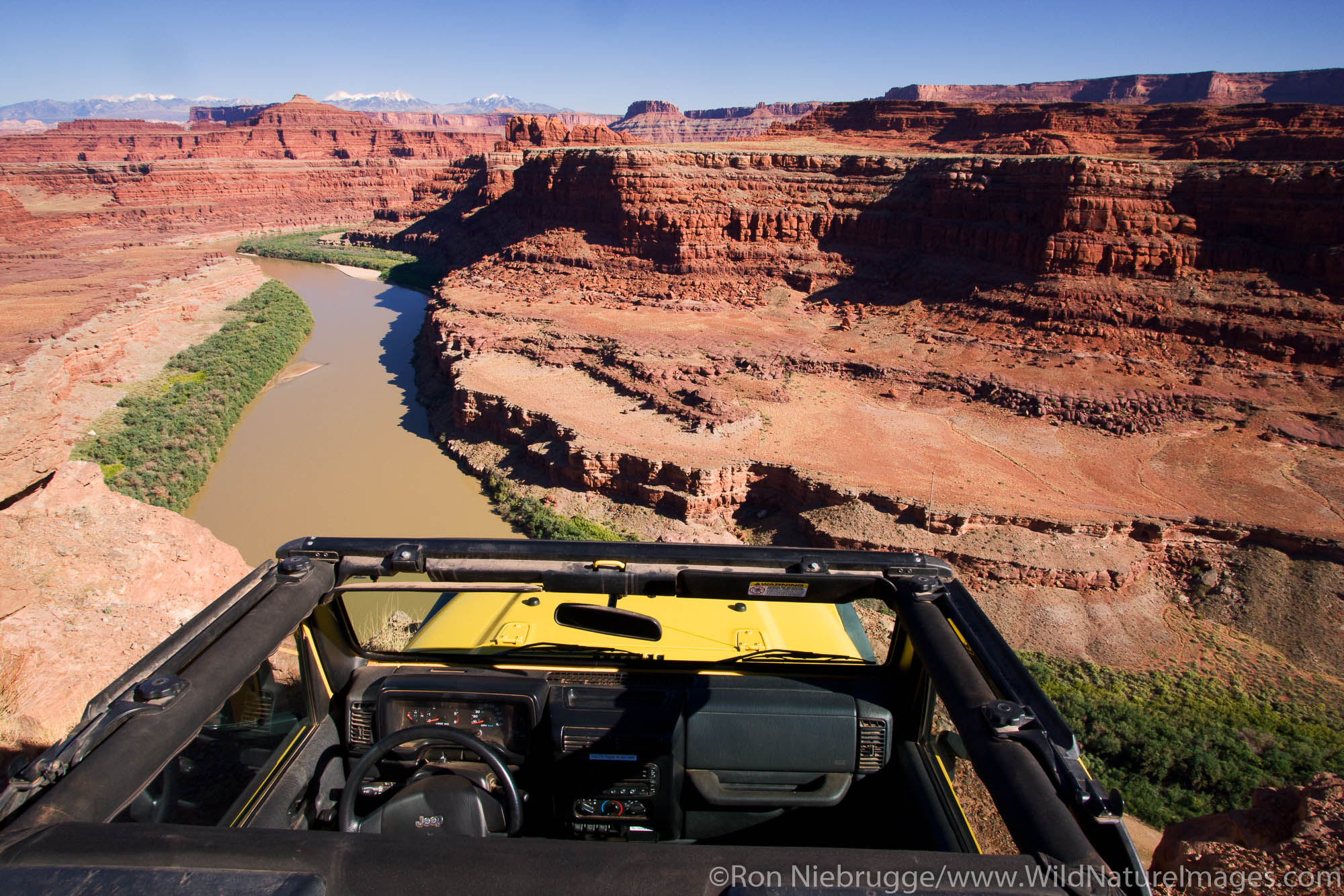 A jeep at Thelma and Louise Point, near Island in the Sky District, Canyonlands National Park, Moab, Utah.