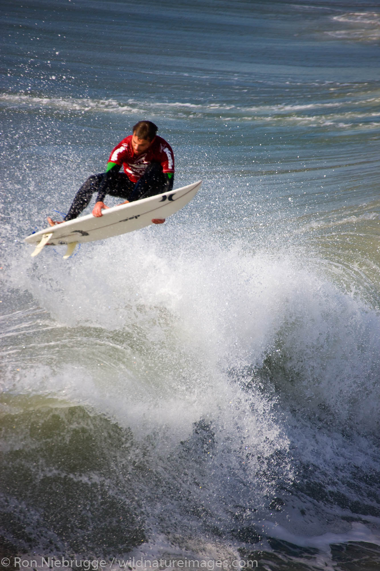 Brandon Guilmette competing in the Katin Pro/Am surf competition at Huntington Beach Pier, Orange County, California.