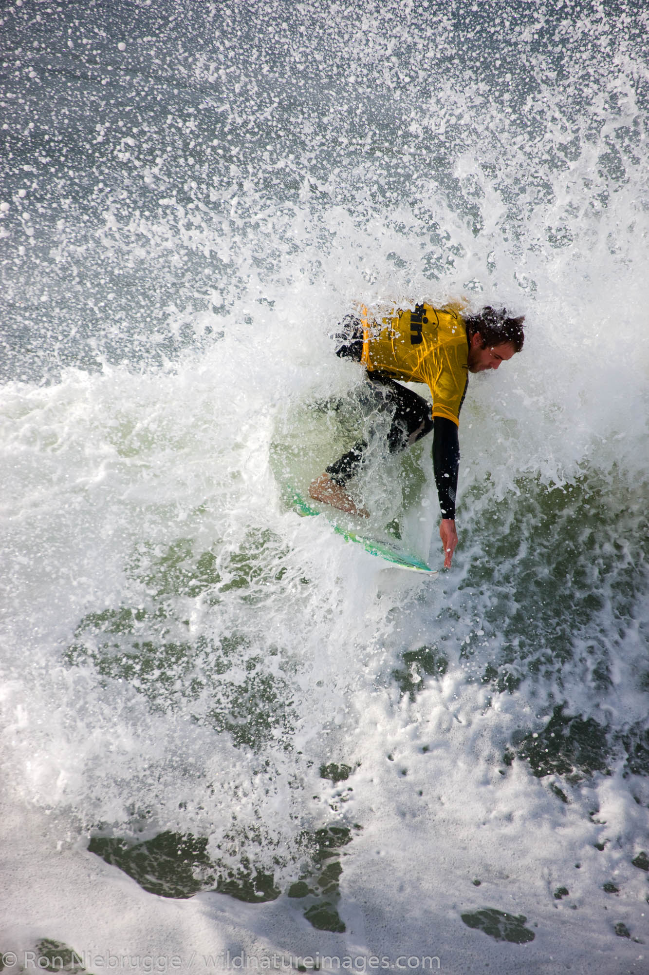 Pascal Stansfield competing in the Katin Pro/Am surf competition at Huntington Beach Pier, Orange County, California.