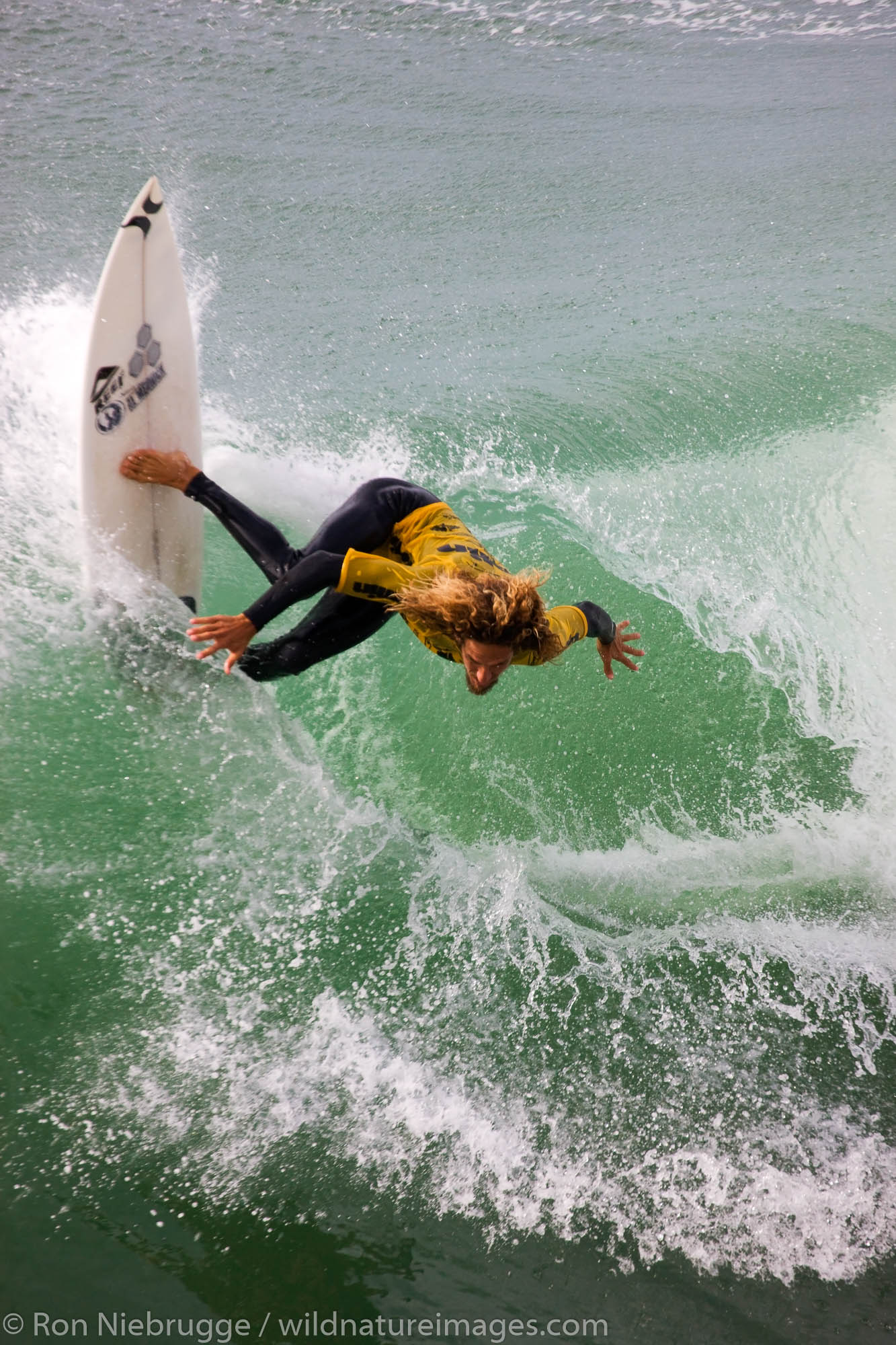Rob Machado competing in the Katin Pro/Am surf competition at Huntington Beach Pier, Orange County, California.