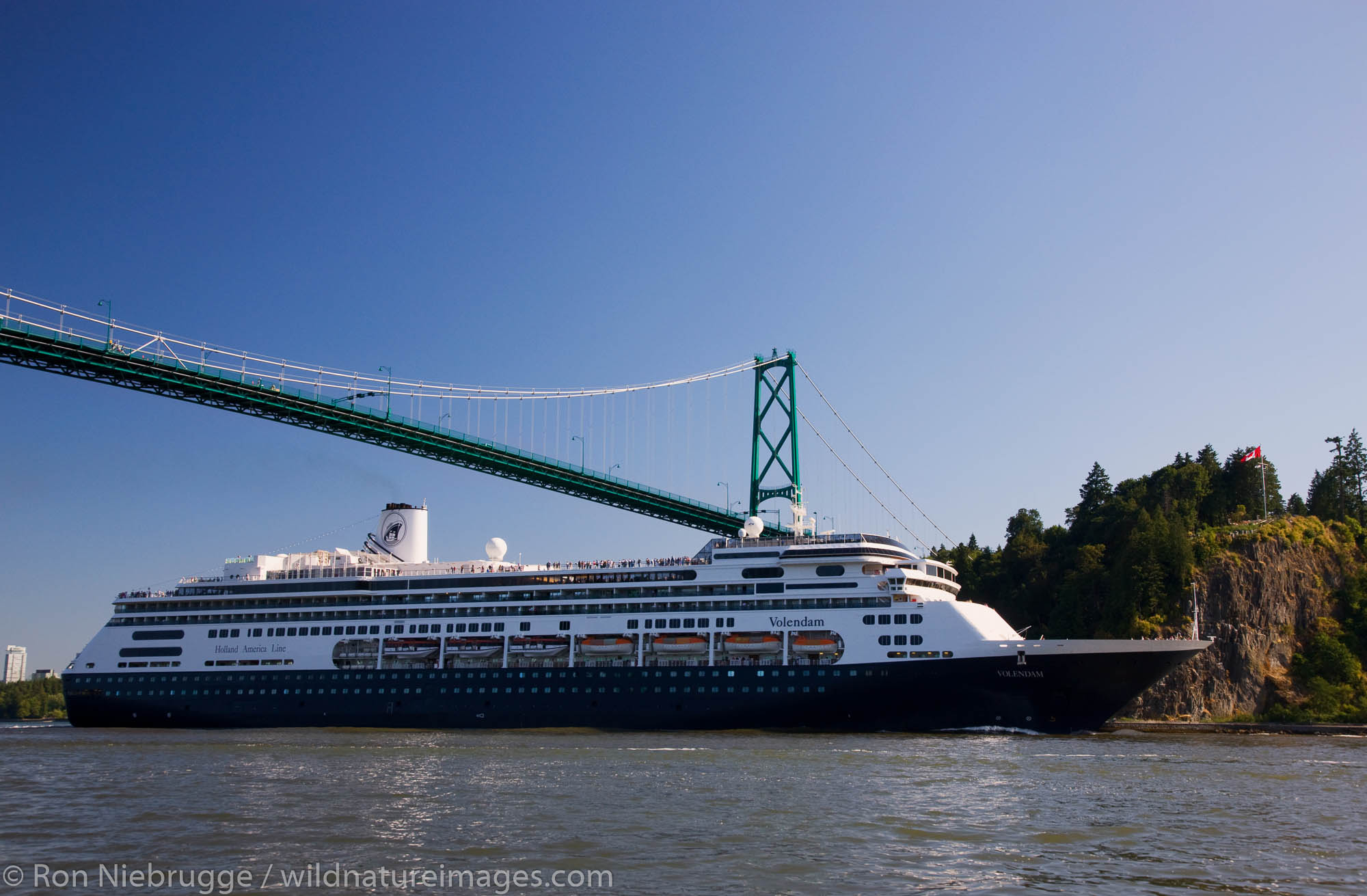 Holland America cruiseship Volendam passing under the Lions Gate Bridge, Vancouver, British Columbia, Canada.