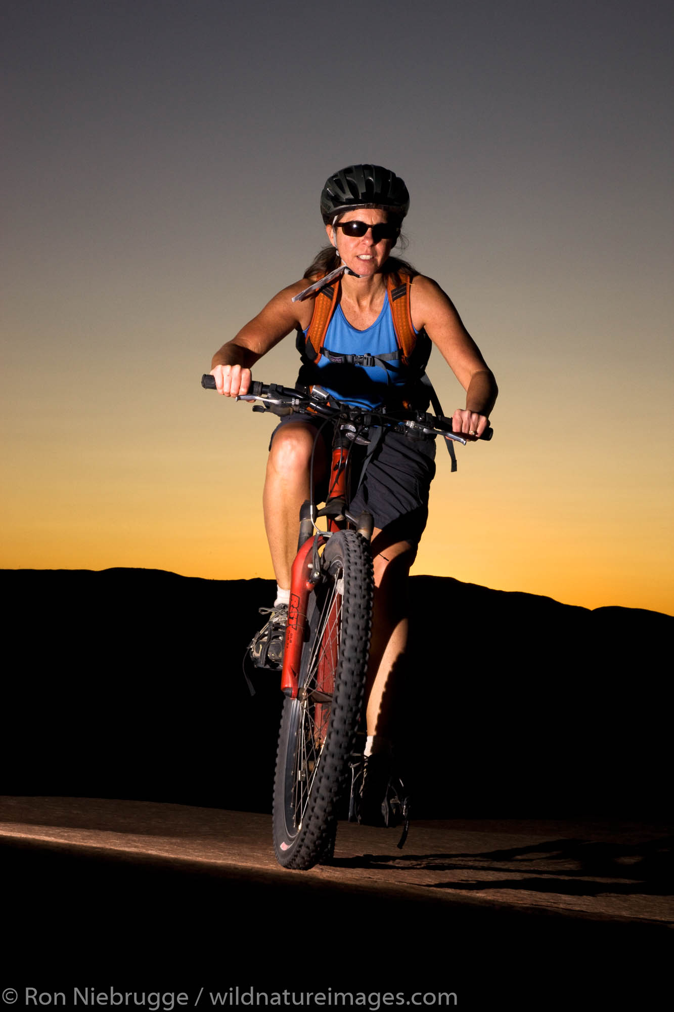 Mountain biking the famous Slickrock Trail, Moab, Utah.  (model released)